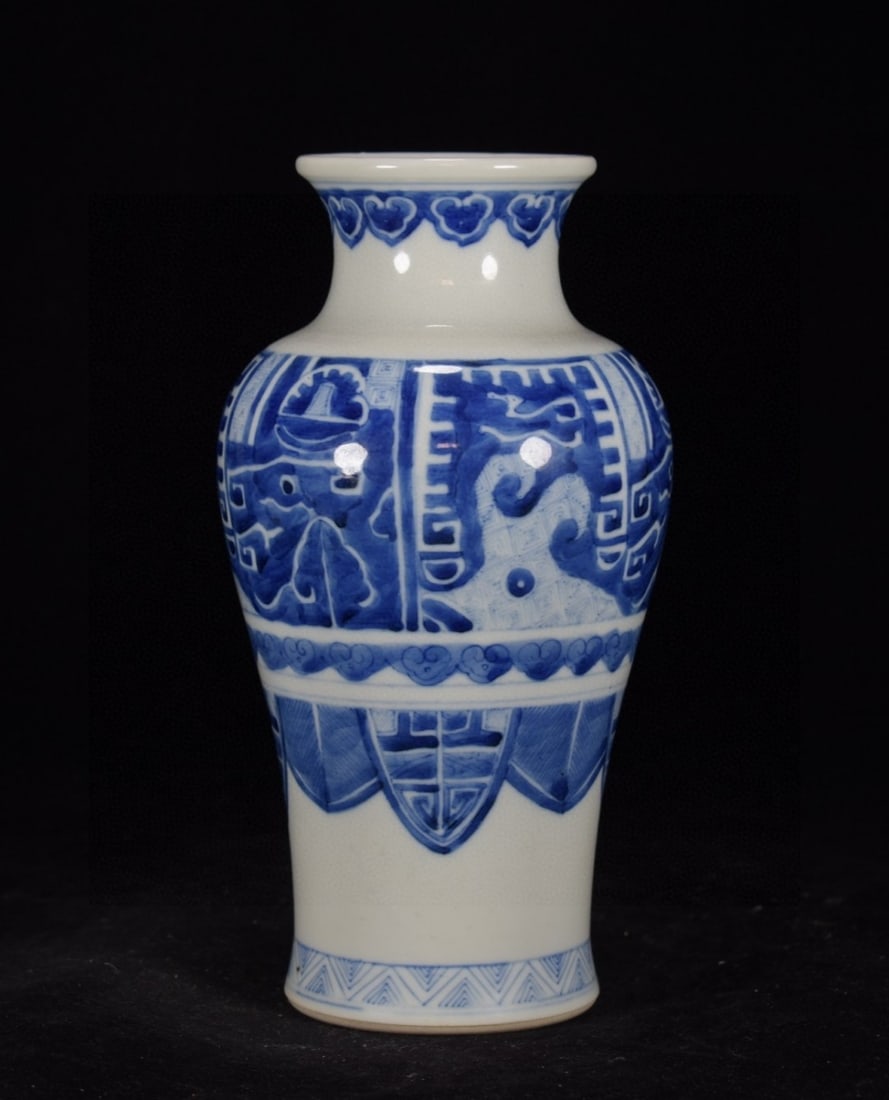 An Exquisite Blue and White Taotie Pattern Vase: An Exquisite Blue and White Taotie Pattern Vase,Qing Dynasty,China,with Kangxi Six-character Mark,Size:9.4inx4.7in,青花饕餮纹瓶,中国清代,