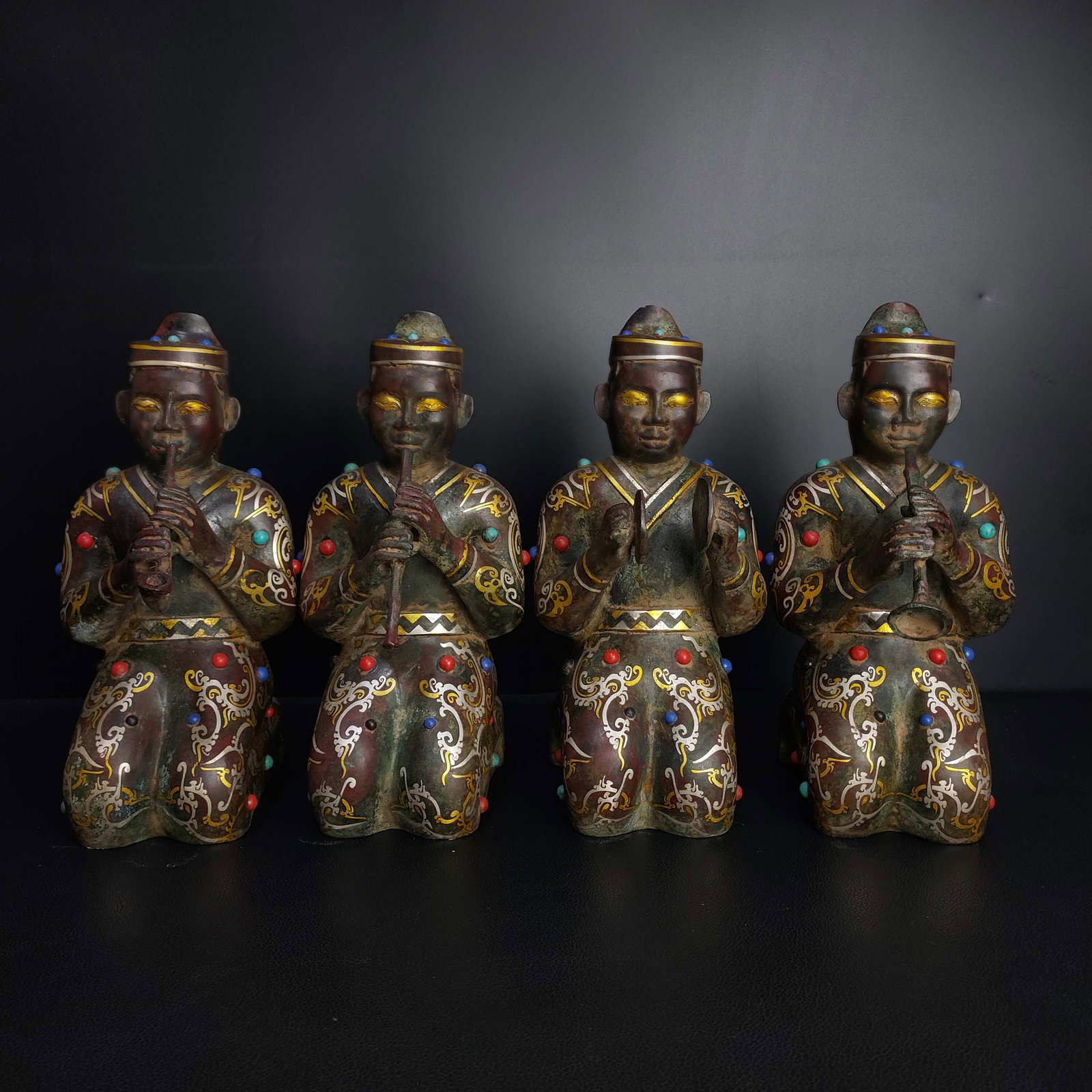 A Set of Fine Bronze Gold and Slver Inlay Figure Ornament,Inlaid Gems: A Set of Fine Bronze Gold and Slver Inlay Figure Ornament,Inlaid Gems,the Warring States period in China,Size:9.8inx6.3in,Weight:7317g,一套青铜错金银人&