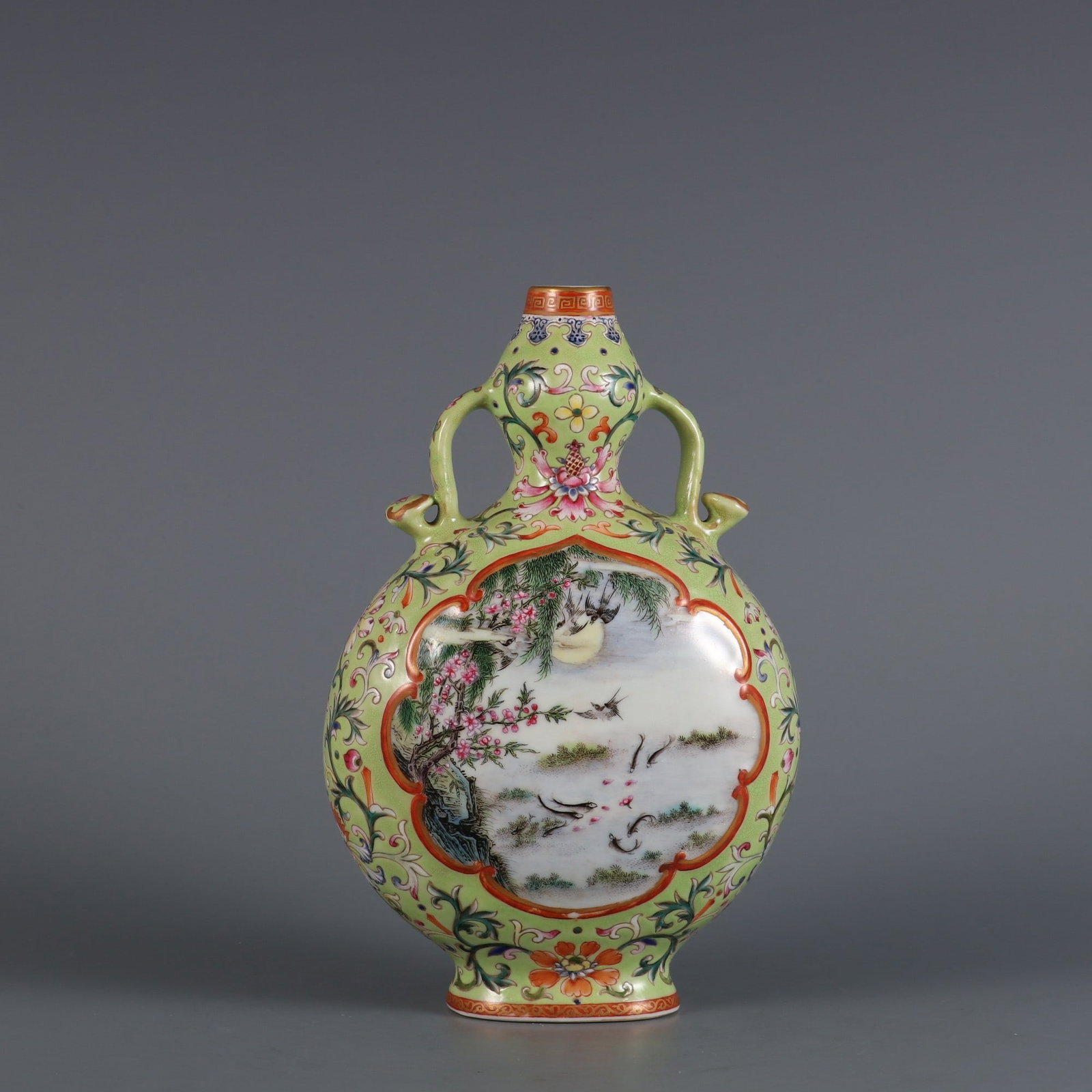 An Exquisite Famille-Rose Green Ground Flower and Bird Pattern Lotus Pattern Double-Ears Vase: An Exquisite Famille-Rose Green Ground Flower and Bird Pattern Lotus Pattern Double-Ears Vase,Qing Dynasty,China,Qianlong Six-character Mark,Size:8.1inx4.9in,粉彩绿地花&#
