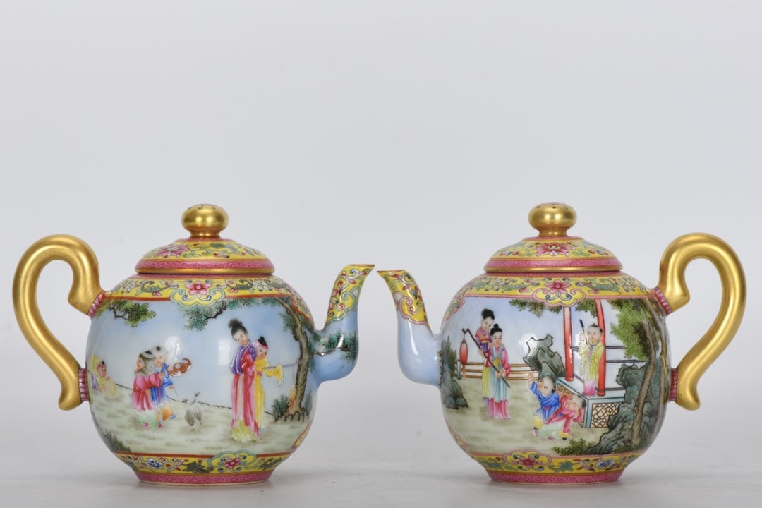 A Pair of Exquisite Enamel Yellow Ground Character and Story Pattern Teapot (1 of 9)