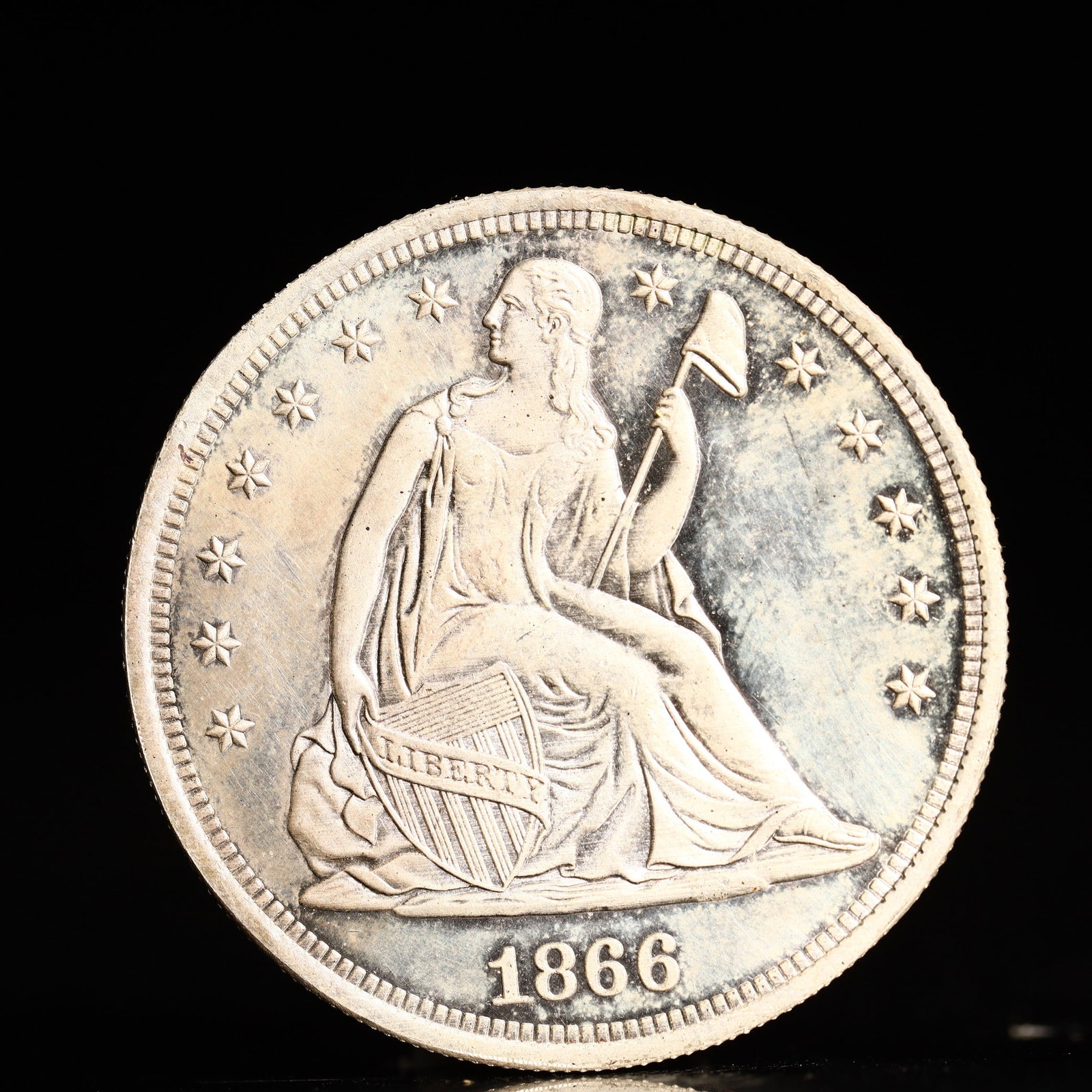 USA One Dollar 1866 Coin: American coin. IN GOD WE TRUST / LIBERTY / 1866 / UNITED STATES OF AMERICA / ONE DOL. Weight:26.9g.