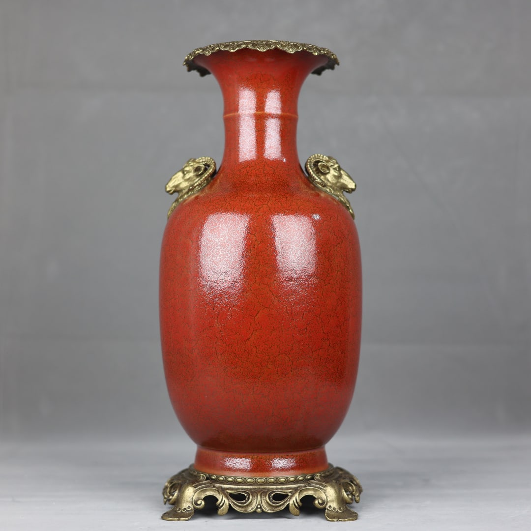 An Exquisite Red Glazed Inlaid Bronze Double-Ears Vase: An Exquisite Red Glazed Inlaid Bronze Double-Ears VaseQing Dynasty,China,Kangxi Six-character Mark,红釉镶铜双耳瓶,中国清代,康