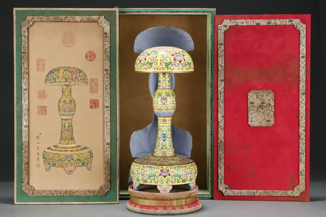 An Exquisite Famille-Rose Yellow Ground Lotus Pattern Hatstand: An Exquisite Famille-Rose Yellow Ground Lotus Pattern HatstandQing Dynasty, China, Qianlong Four-character MarkSize:14.8inx7.1in,粉彩黄地缠枝莲纹帽