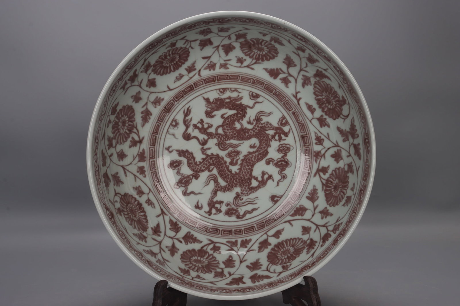 An Exquisite Underglaze-Red Dragon Pattern Lotus Pattern Bowl: An Exquisite Underglaze-Red Dragon Pattern Lotus Pattern Bowl,Ming Dynasty, China,Size:5.5inx16.5in,釉里红龙纹缠枝莲纹碗,中国