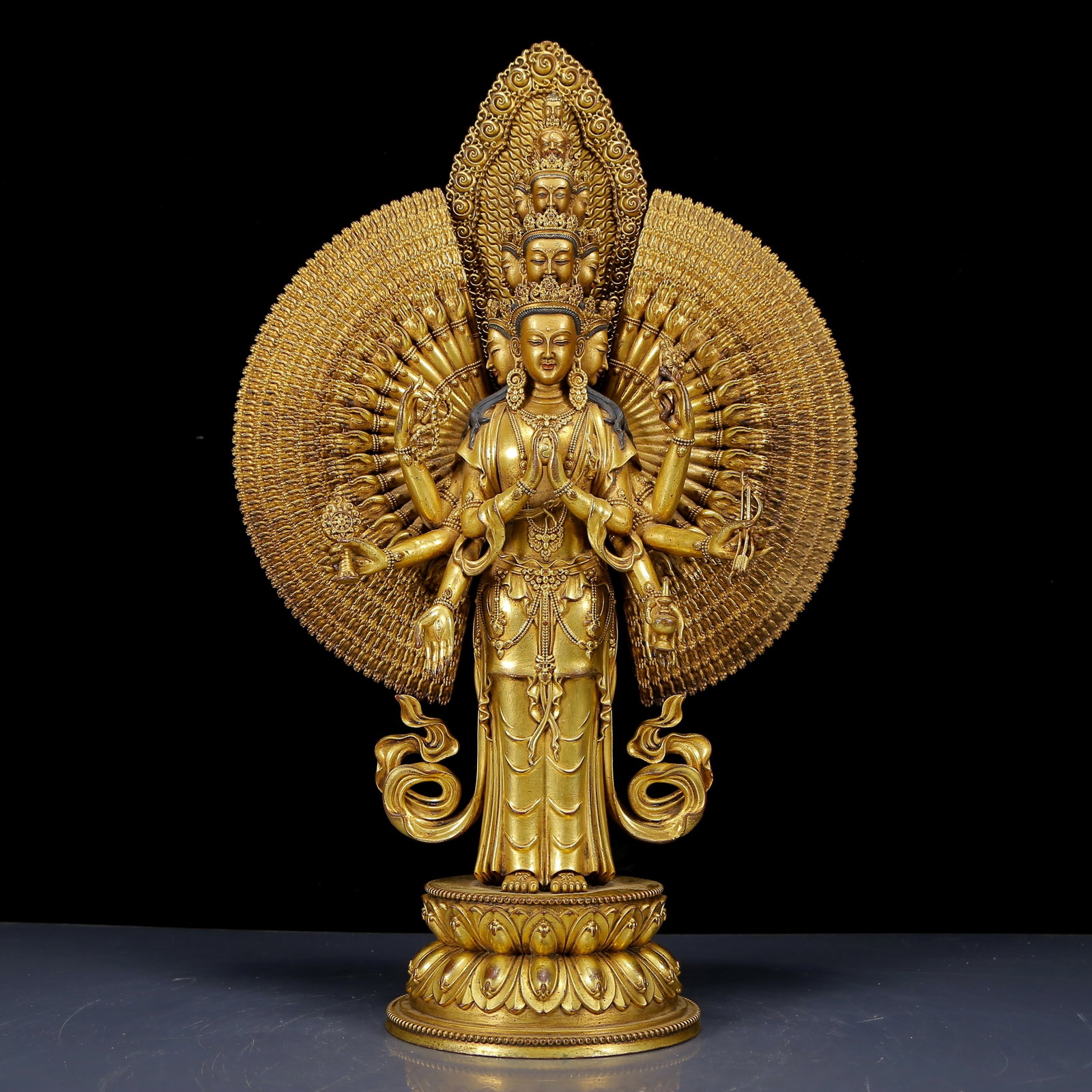 A Solemn Gilt Bronze Statue of Eleven-Headed and Thousand-hand Guanyin: A Solemn Gilt Bronze Statue of Eleven-Headed and Thousand-hand Guanyin,Ming Dynasty,China,Yongle Six-character Mark,Size:13inx5.5inx19.3in,Weight:11005g,铜鎏金十一面