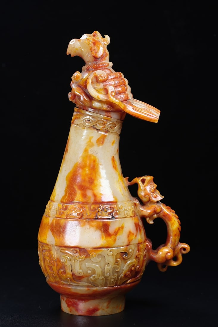 An Exquisite White Jade Auspicious Animal Pattern with Cover Vase (1 of 10)