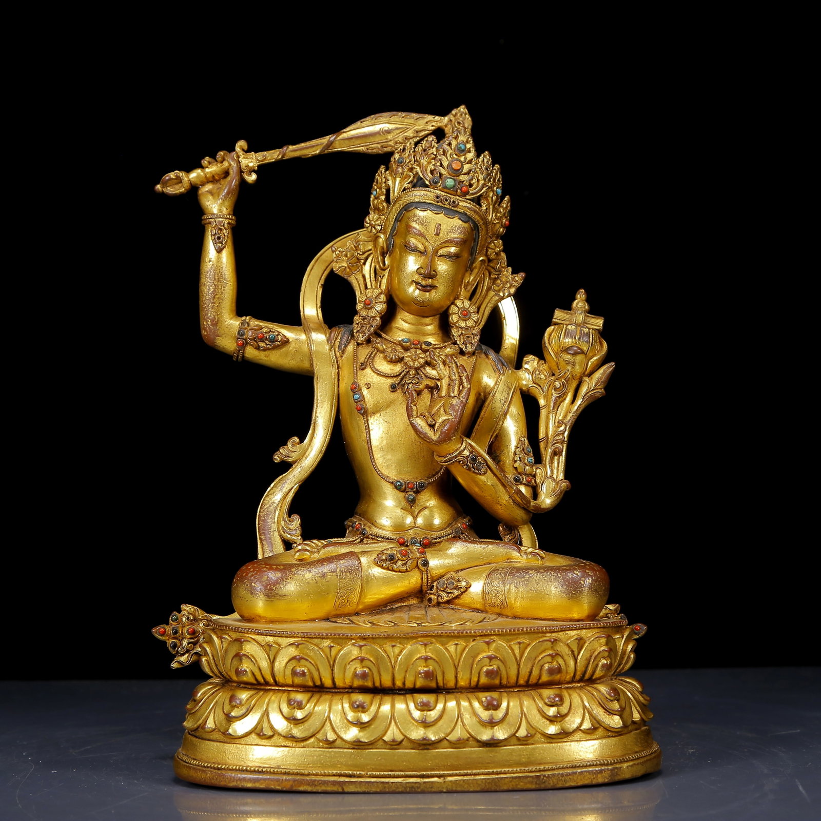 A Solemn Gilt Bronze Inlaid Turquoise Statue of Manjusri: A Solemn Gilt Bronze Inlaid Turquoise Statue of Manjusri,Qing Dynasty,China,Qianlong Seven-character Mark,Size:6.7inx4.5inx10.2in,Weight:3025g,铜鎏金嵌绿松石&