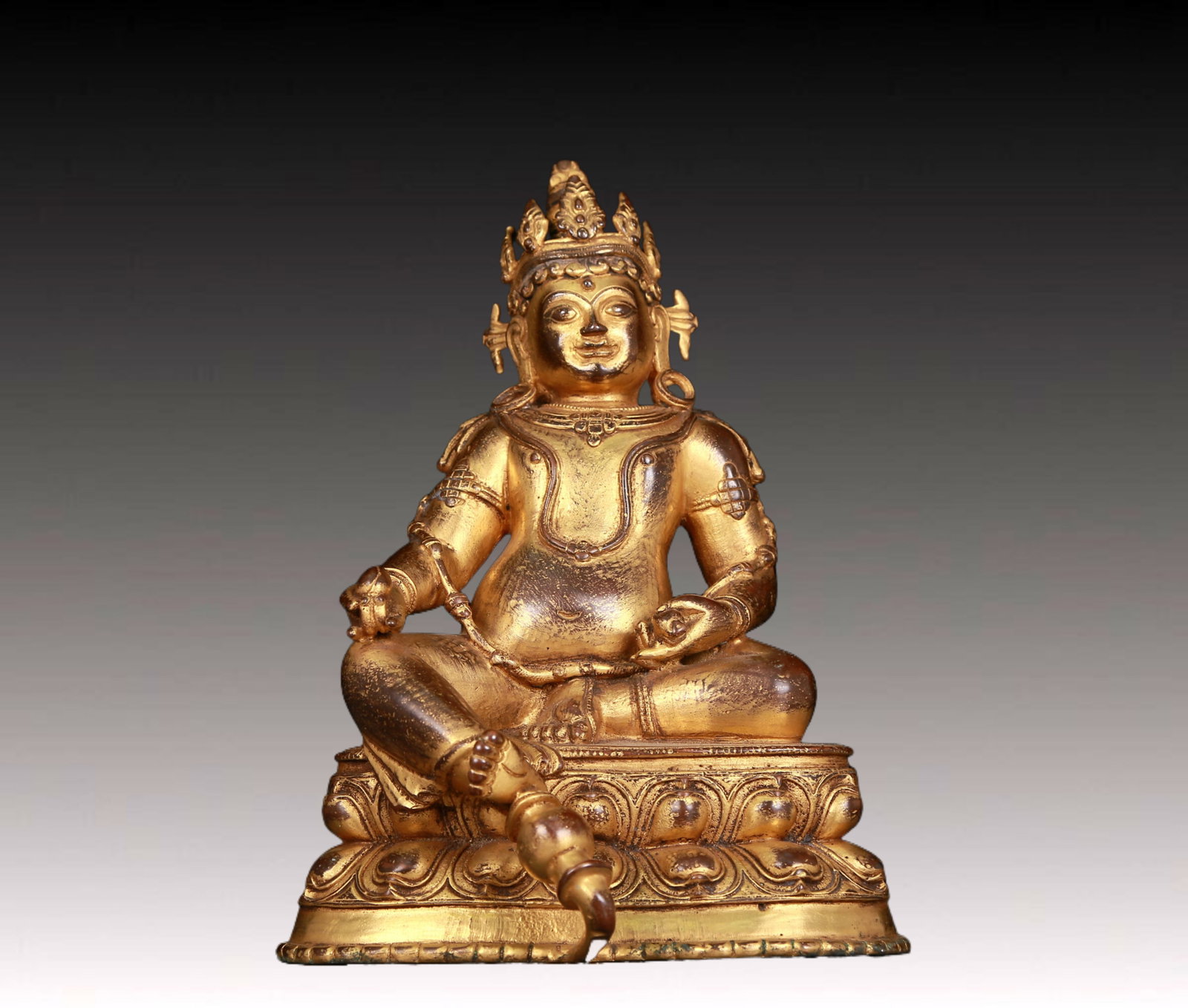 An exquisite gilt bronze statue of Mammon