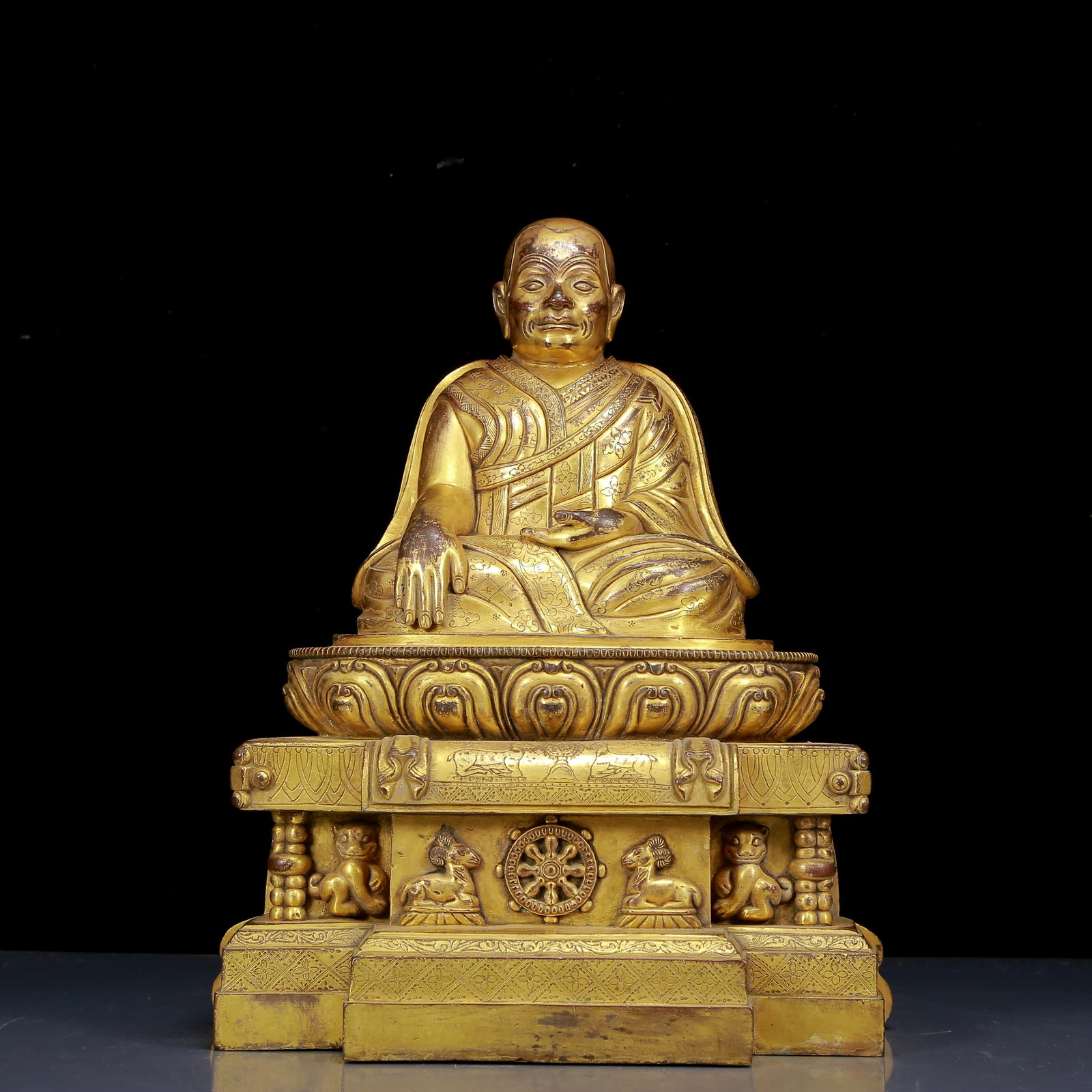 A Solemn Gilt Bronze Statue of Guru: A Solemn Gilt Bronze Statue of Guru,Ming Dynasty,China,Size:11.4inx8.7inx14.2in,Weight:10170g,铜鎏金上师像,中国明代