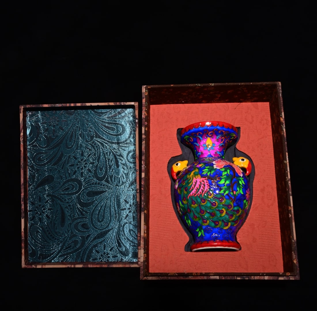 An Exquisite Enamel Flower and Bird Pattern Double-Ears Vase,: An Exquisite Enamel Flower and Bird Pattern Double-Ears Vase,Qing Dynasty, China,Qianlong Six-character Mark,Size:8.7inx6.3in 珐琅彩花鸟纹双耳瓶