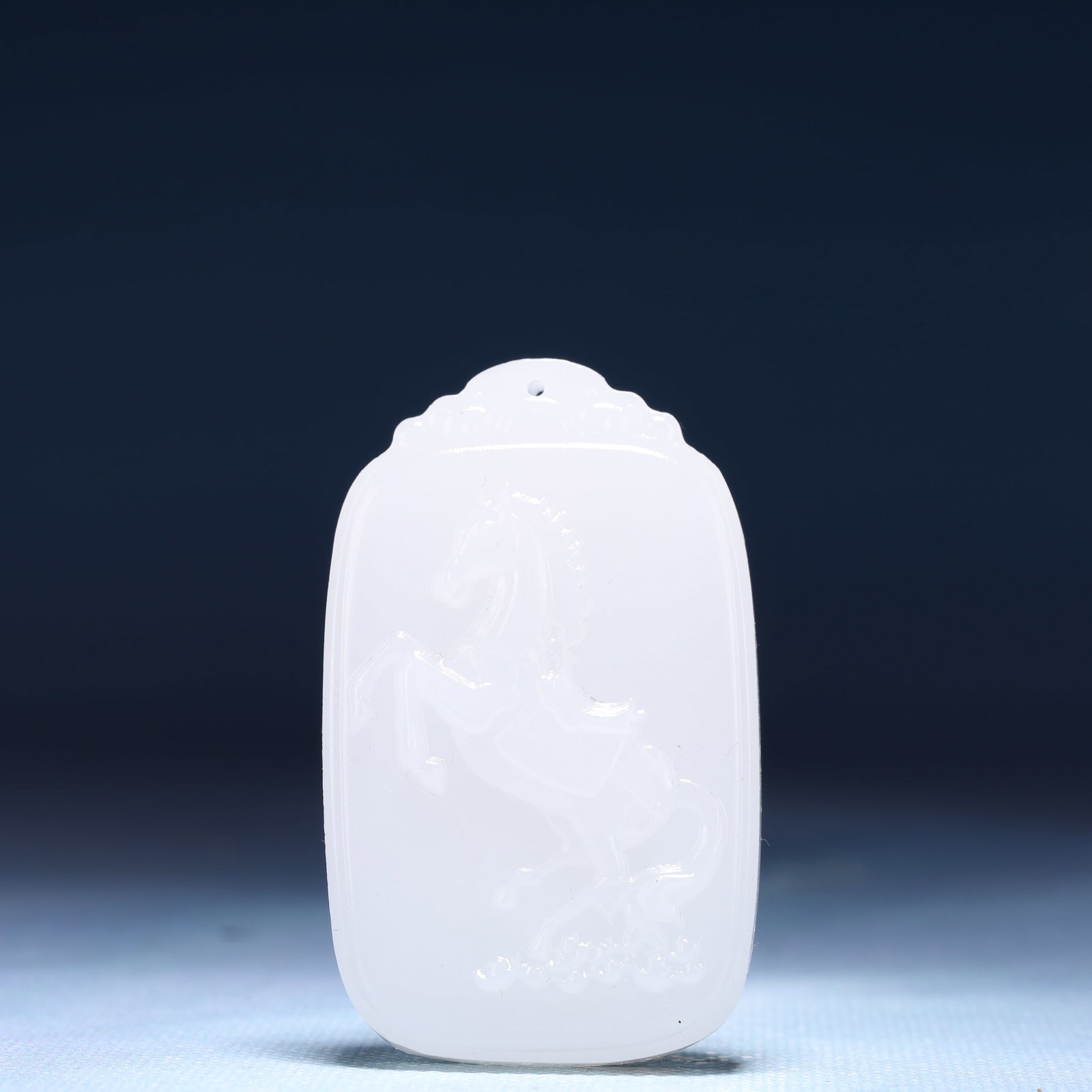 An Exquisite White Jade Horse Pattern Pendant: An Exquisite White Jade Horse Pattern Pendant,Size:1.6inx0.4inx2.4in,Weight:46g 白玉骏马纹牌