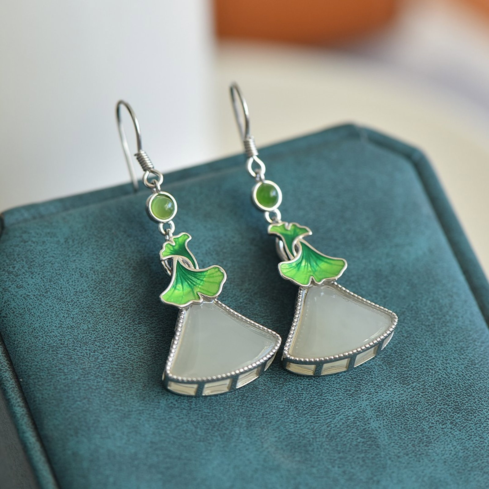 A Pair of Exquisite Sterling Silver Inlaid White Jade Earrings: A Pair of Exquisite Sterling Silver Inlaid White Jade Earrings,Size:12mmx16mm 一对纯银镶白玉耳环