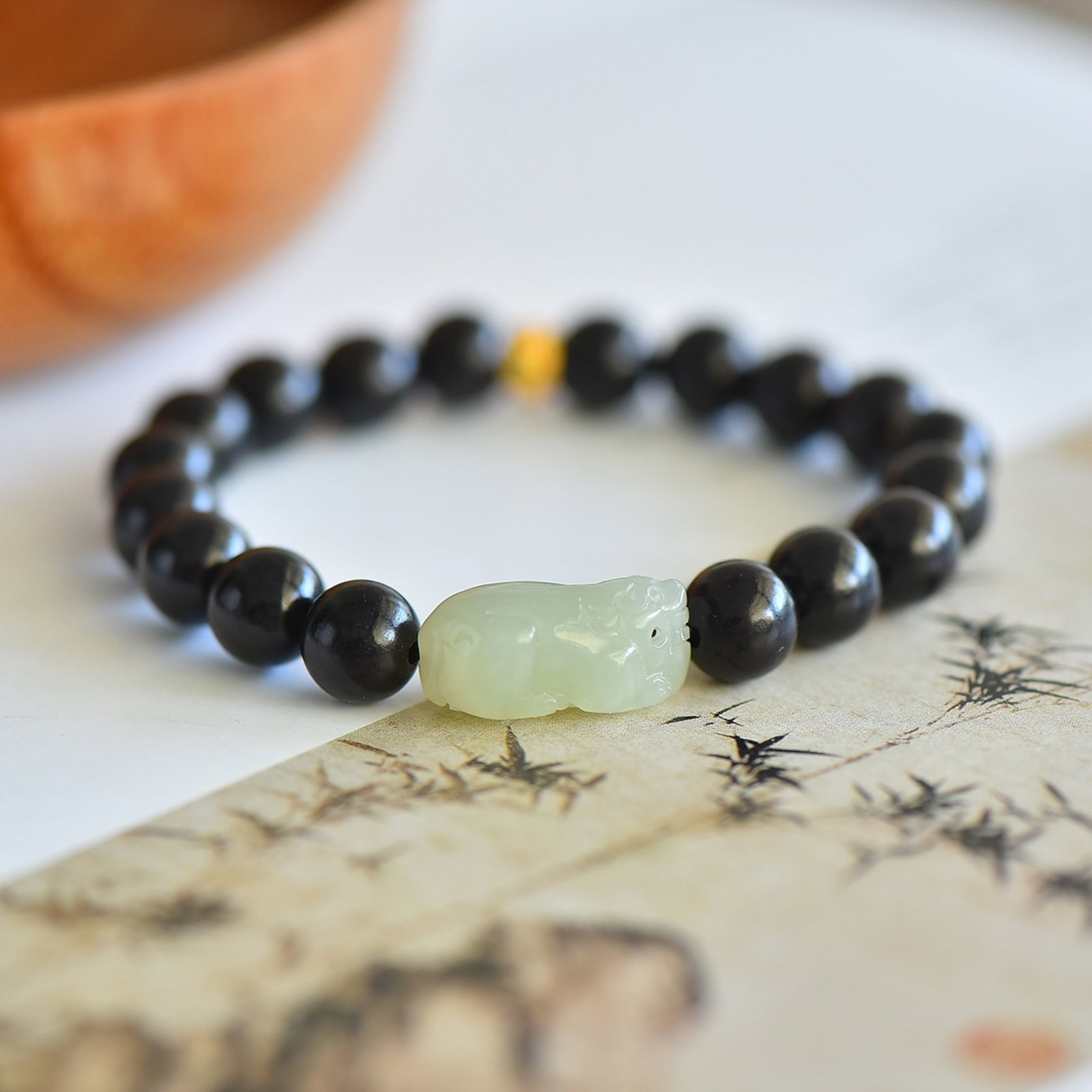 An Exquisite White Jade Ebony Bracelets: An Exquisite White Jade Ebony Bracelets,Size:14mmx23mm 寓意:天地守护 吉祥如意 辟邪护佑