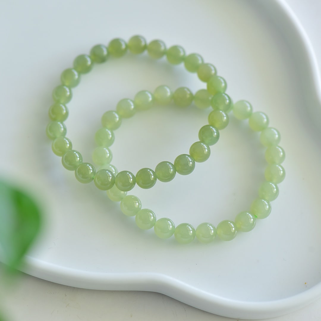 An Exquisite Greenish Jade Bracelets (1 of 5)