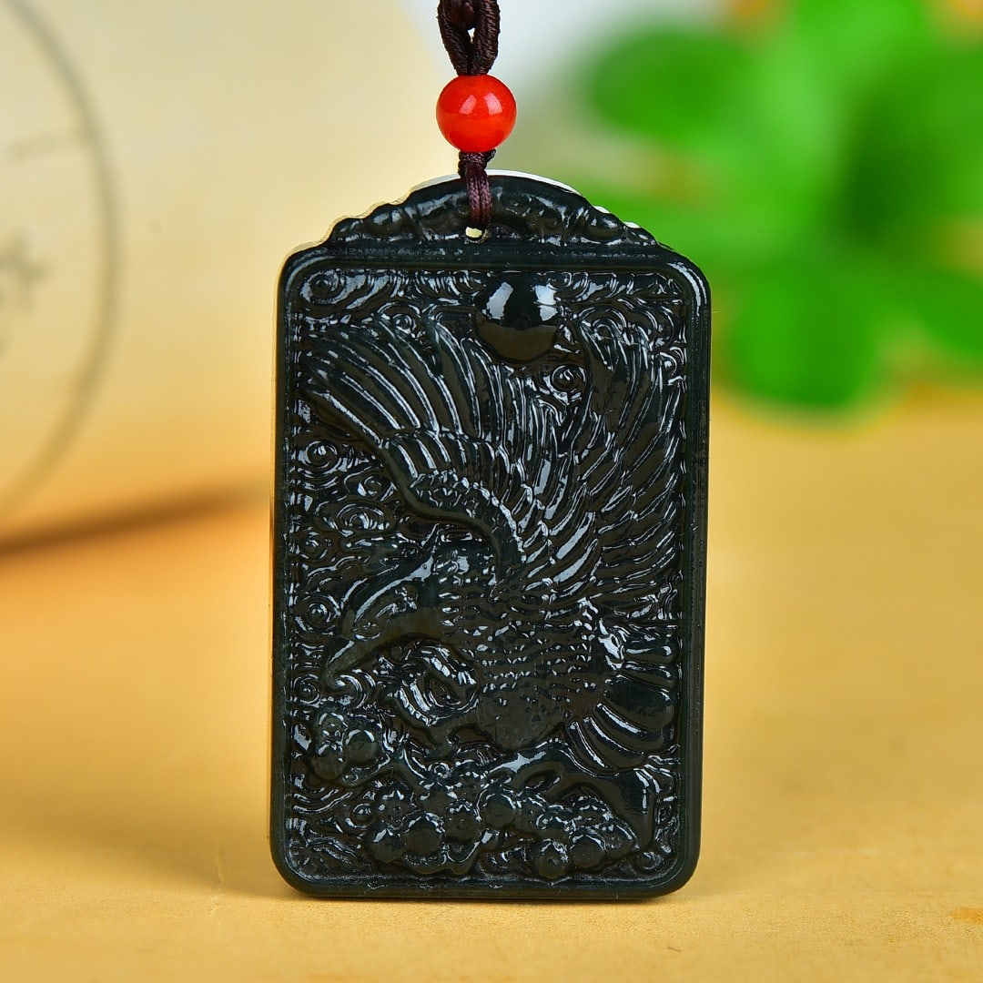 An Exquisite Sapphire Auspicious Cloud and Eagle Pattern Pendant: An Exquisite Sapphire Auspicious Cloud and Eagle Pattern Pendant,Size:28mmx45mm 寓意:大展宏图 青玉祥云鹰纹牌