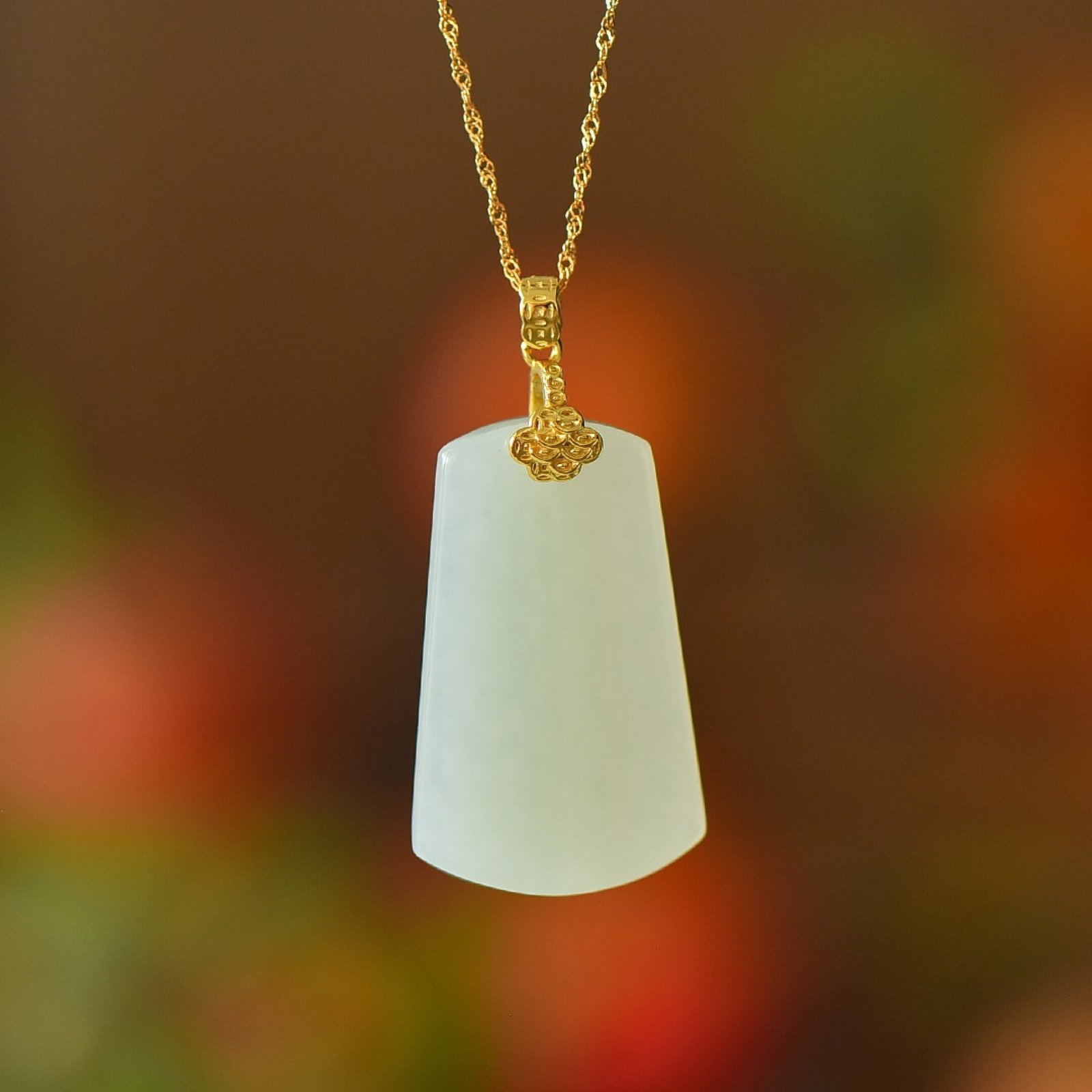 An Exquisite Sterling Silver-Gold Plated Inlaid White Jade Pendant: An Exquisite Sterling Silver-Gold Plated Inlaid White Jade Pendant,Size:24mmx38mm 纯银镀金镶白玉吊坠