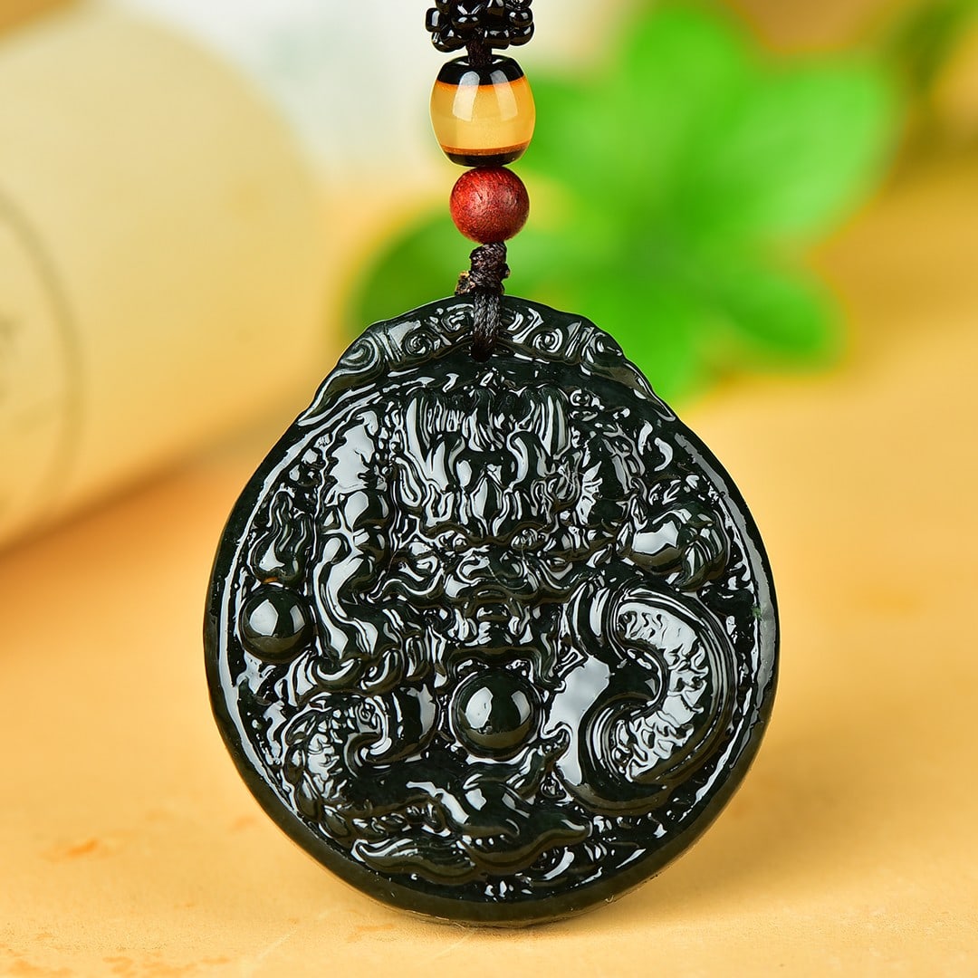 An Exquisite Sapphire Auspicious Cloud and Dragon Pattern Pendant: An Exquisite Sapphire Auspicious Cloud and Dragon Pattern Pendant,Size:45mmx49mm 寓意:吉祥如意 青玉祥云龙纹挂件