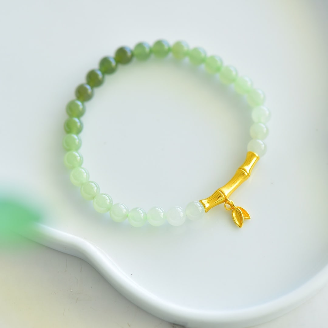 An Exquisite Greenish Jade Bracelets (1 of 4)