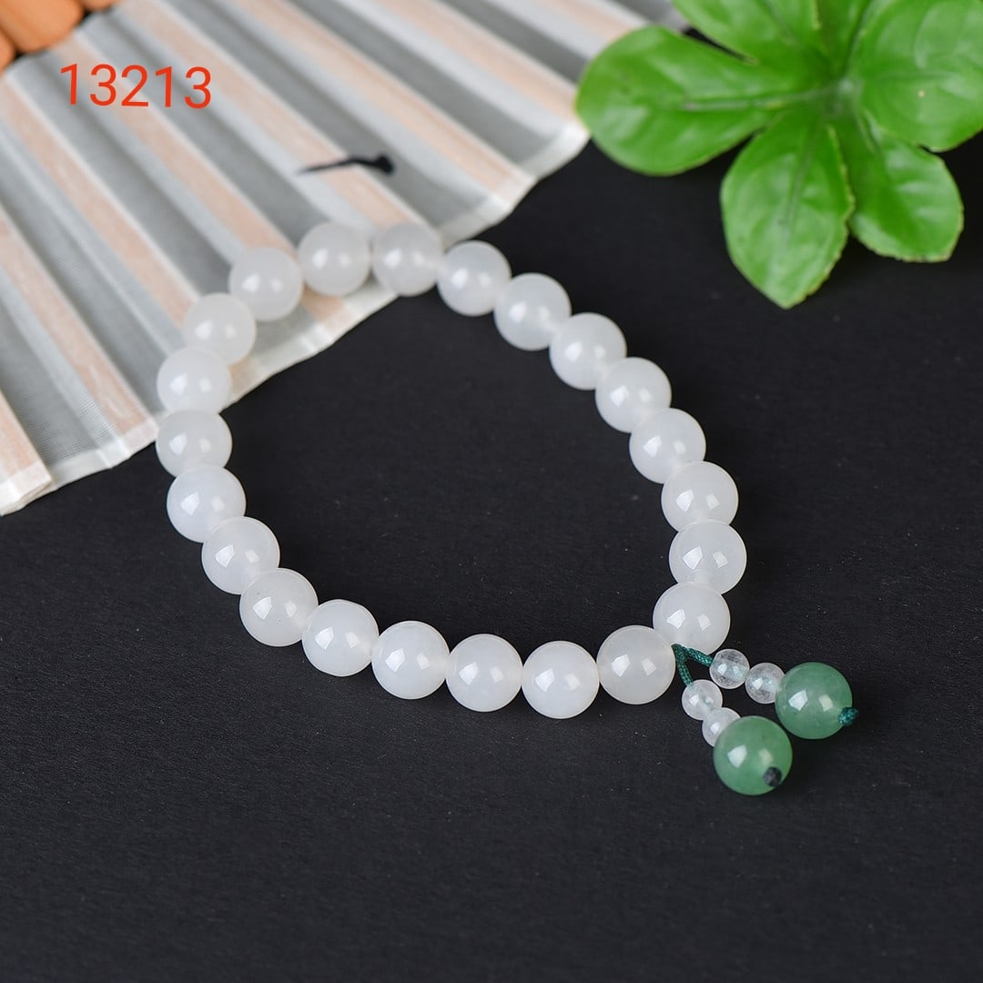 An Exquisite White Jade Bracelets: An Exquisite White Jade Bracelets,Size:8mm 寓意:吉祥如意 招财进宝 白玉手串