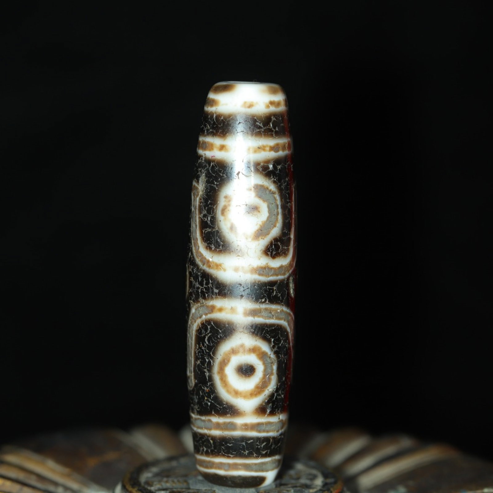 An Exquisite Six Eyes Dzi Bead Pendant: An Exquisite Six Eyes Dzi Bead Pendant,Size:56mmx16mm,Weight:24g 六眼天珠挂件
