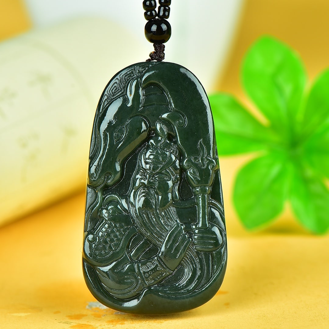 An Exquisite Sapphire Guangong Pattern Pendant: An Exquisite Sapphire Guangong Pattern Pendant,Size:33mmx59mm 寓意:忠义千秋 青玉关公像纹吊坠