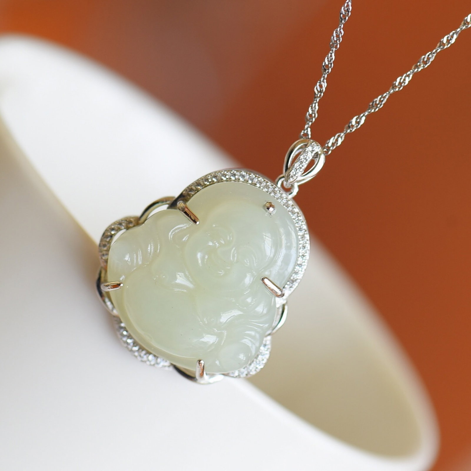 An Exquisite Sterling Silver Inlaid White Jade Pendant: An Exquisite Sterling Silver Inlaid White Jade Pendant,Size:22mmx24mmmm 纯银镶白玉吊坠