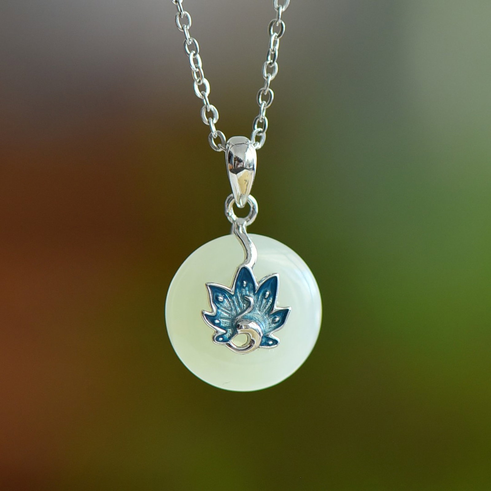 An Exquisite Sterling Silver Inlaid White Jade Enamel Pendant: An Exquisite Sterling Silver Inlaid White Jade Enamel Pendant 纯银镶白玉珐琅吊坠