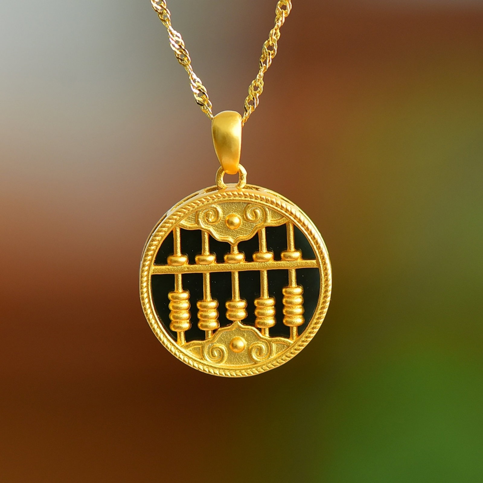 An Exquisite Sterling Silver-Gold Plated Inlaid Black Jade Pendant: An Exquisite Sterling Silver-Gold Plated Inlaid Black Jade Pendant 纯银镀金镶黑玉吊坠