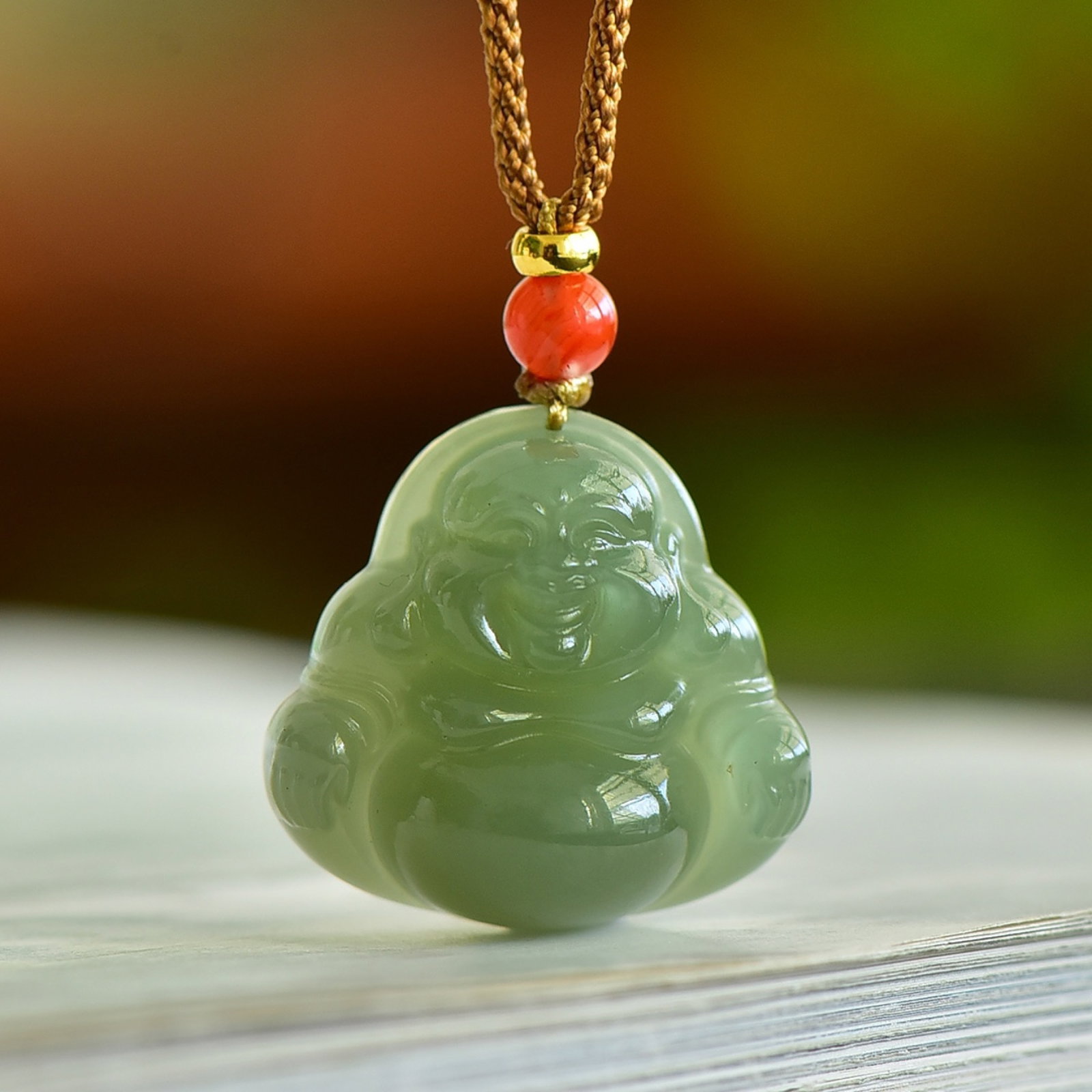 An Exquisite Sapphire Maitreya Buddha Pendant: An Exquisite Sapphire Maitreya Buddha Pendant,Size:25mmx25mm 青玉弥勒佛像吊坠