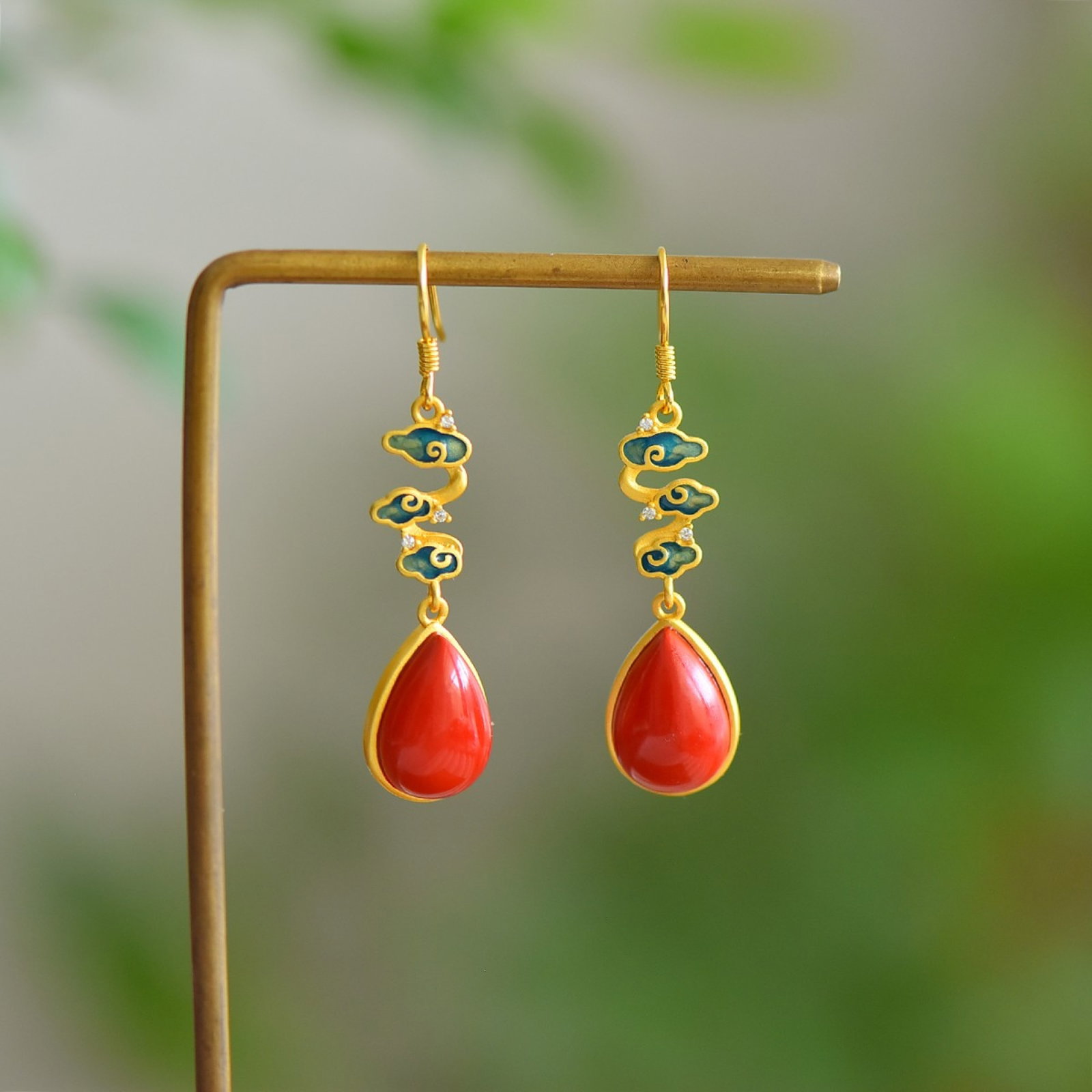 A Pair of Exquisite Sterling Silver-Gold Plated Inlaid Cinnabar Earrings,Inlaid Diamond: A Pair of Exquisite Sterling Silver-Gold Plated Inlaid Cinnabar Earrings,Inlaid Diamond,Size:10mmx14mm 寓意:平步青云,瑞气祥云