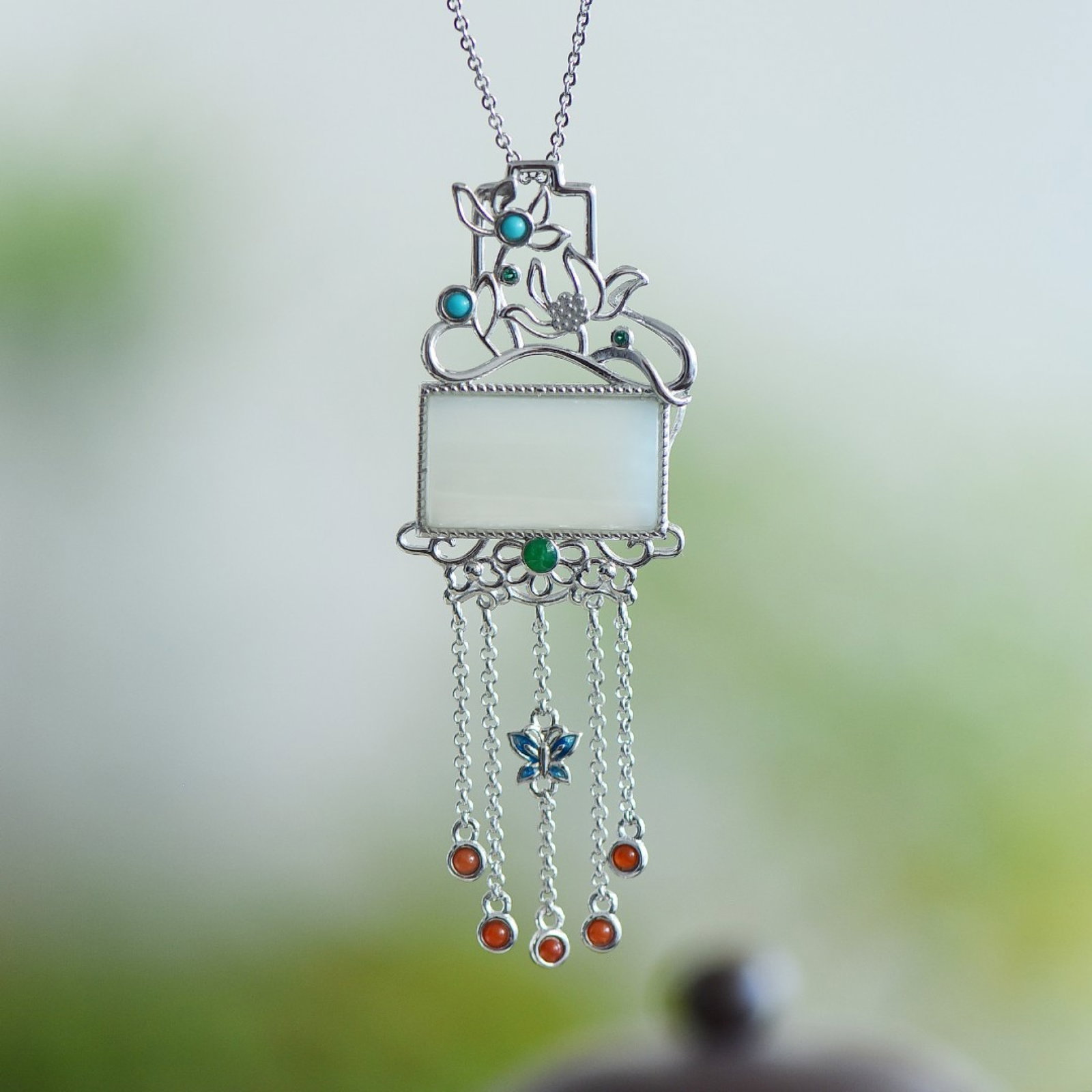 An Exquisite Sterling Silver Inlaid White Jade Pendant,Inlaid Turquoise: An Exquisite Sterling Silver Inlaid White Jade Pendant,Inlaid Turquoise,Size:11mmx19mm 纯银镶白玉吊坠,嵌绿松石