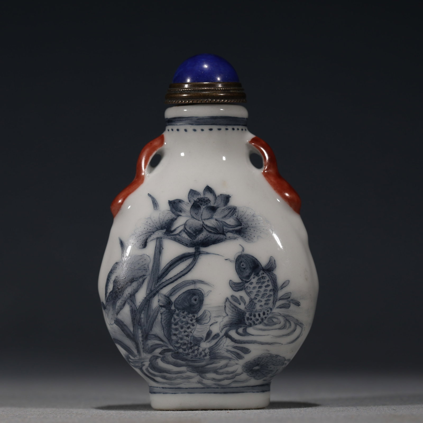 An Exquisite Blue And White With Iron Red Two-Eared Snuff Bottle With Lotus Pond And Fish Pattern: An Exquisite Blue And White With Iron Red Two-Eared Snuff Bottle With Lotus Pond And Fish Pattern,China,Qing Dynasty,Qianlong Mark,Dimensions:3inx1.8in,青花矾红双耳