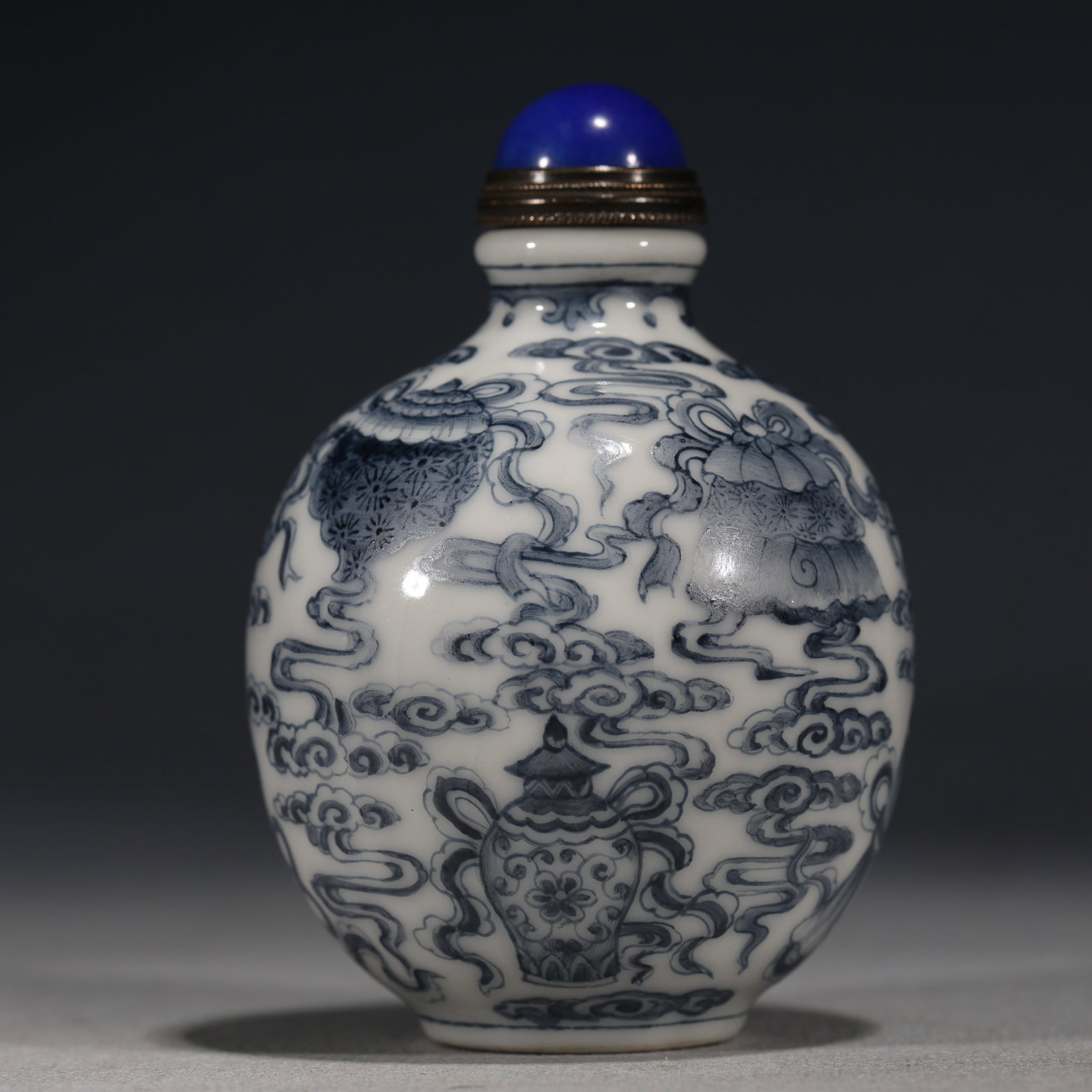 An Exquisite Blue And White Snuff Bottle With Auspicious Cloud And Eight Treasures Pattern: An Exquisite Blue And White Snuff Bottle With Auspicious Cloud And Eight Treasures Pattern,China,Qing Dynasty,Four-Character Yongzheng Mark,Dimensions:3inx2in,青花祥云八&