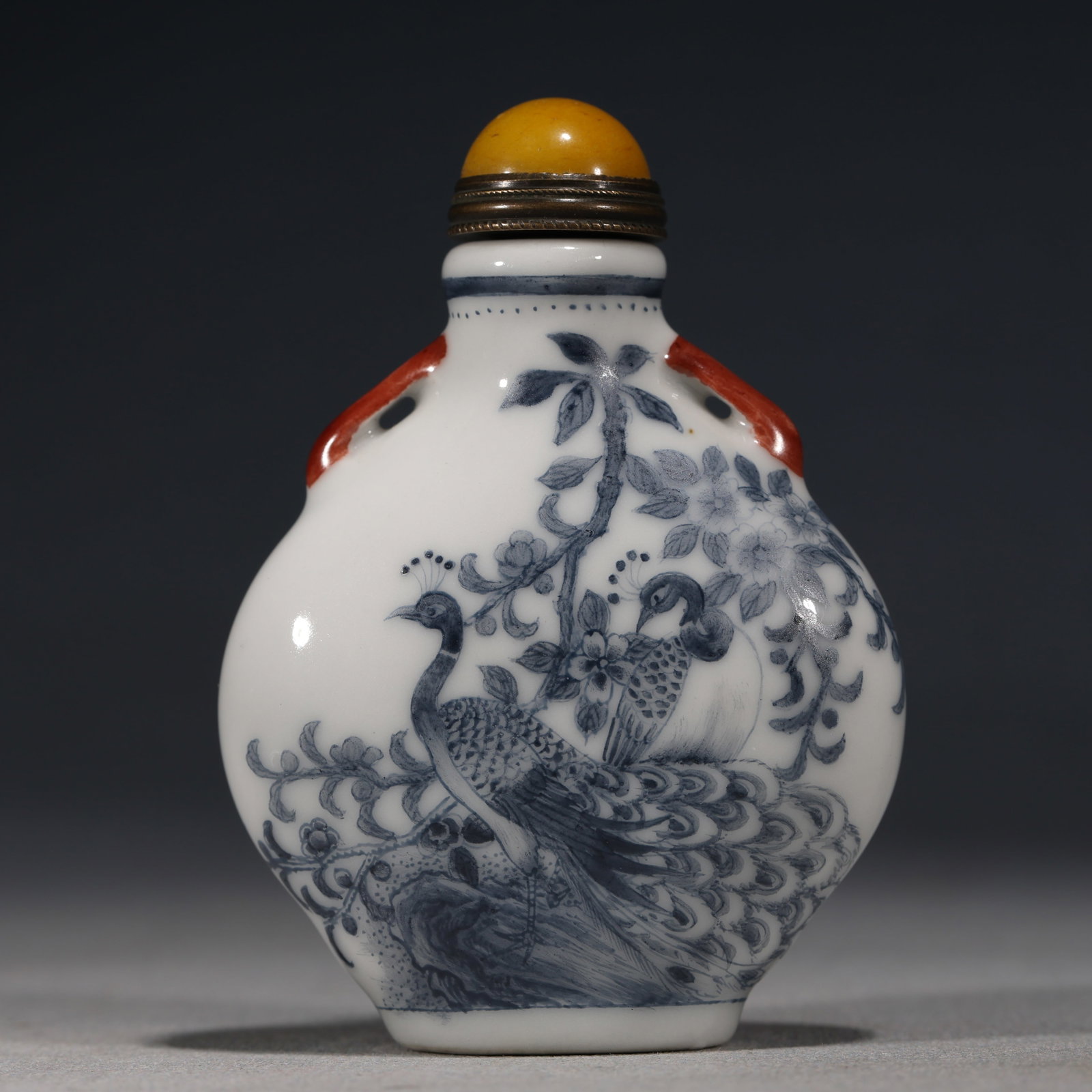 An Exquisite Blue And White Peacock Floral Pattern Snuff Bottle With Iron Red Two Ears: An Exquisite Blue And White Peacock Floral Pattern Snuff Bottle With Iron Red Two Ears,China,Qing Dynasty,Four-Character Qianlong Mark,Dimensions:3inx2.2in,青花孔雀花