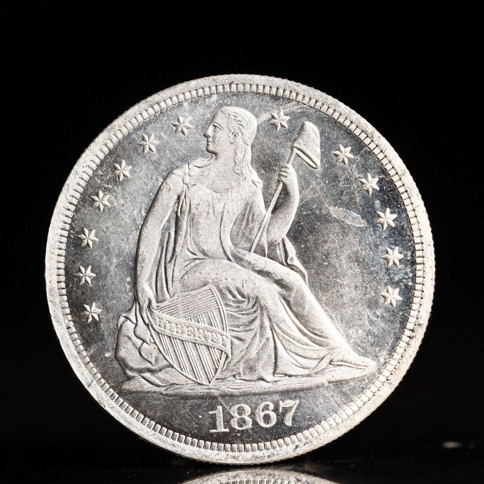 USA One Dollar 1867 Coin: American coin. IN GOD WE TRUST / LIBERTY / 1867 / UNITED STATES OF AMERICA / ONE DOL. Weight:26.9g.