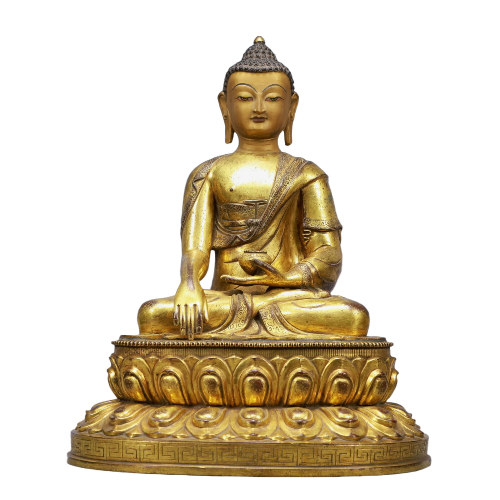 A Solemn Gilt Bronze Statue of Sakyamuni: A Solemn Gilt Bronze Statue of Sakyamuni,Ming Dynasty, China,Size:14inx11.4inx17.7inWeight:15800g 铜鎏金释迦牟尼像,中国明代
