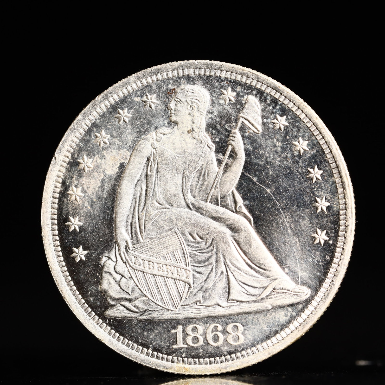 USA One Dollar 1868 Coin: American coin. IN GOD WE TRUST / LIBERTY / 1868 / UNITED STATES OF AMERICA / ONE DOL. Weight:26.9g.