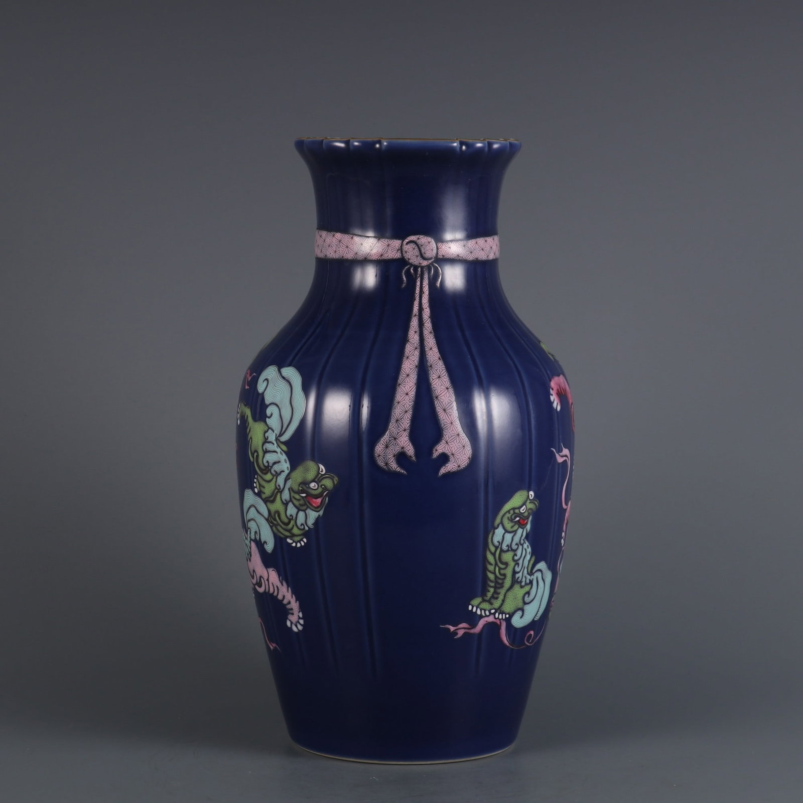 An Exquisite Famille-Rose Ji Blue Glazed Lion Vase: An Exquisite Famille-Rose Ji Blue Glazed Lion Vase,Qing Dynasty,China,Qianlong Six-character Mark,Size:10.8inx3.9in,粉彩霁蓝釉狮子纹瓶,中
