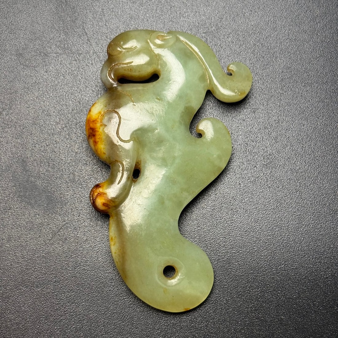 An Exquisite Greenish Jade Auspicious Animal Pendant: An Exquisite Greenish Jade Auspicious Animal Pendant,Han Dynasty,China,Size:3.2inx1.9inx0.5in,Weight:53g,青玉瑞兽挂件,中国汉代