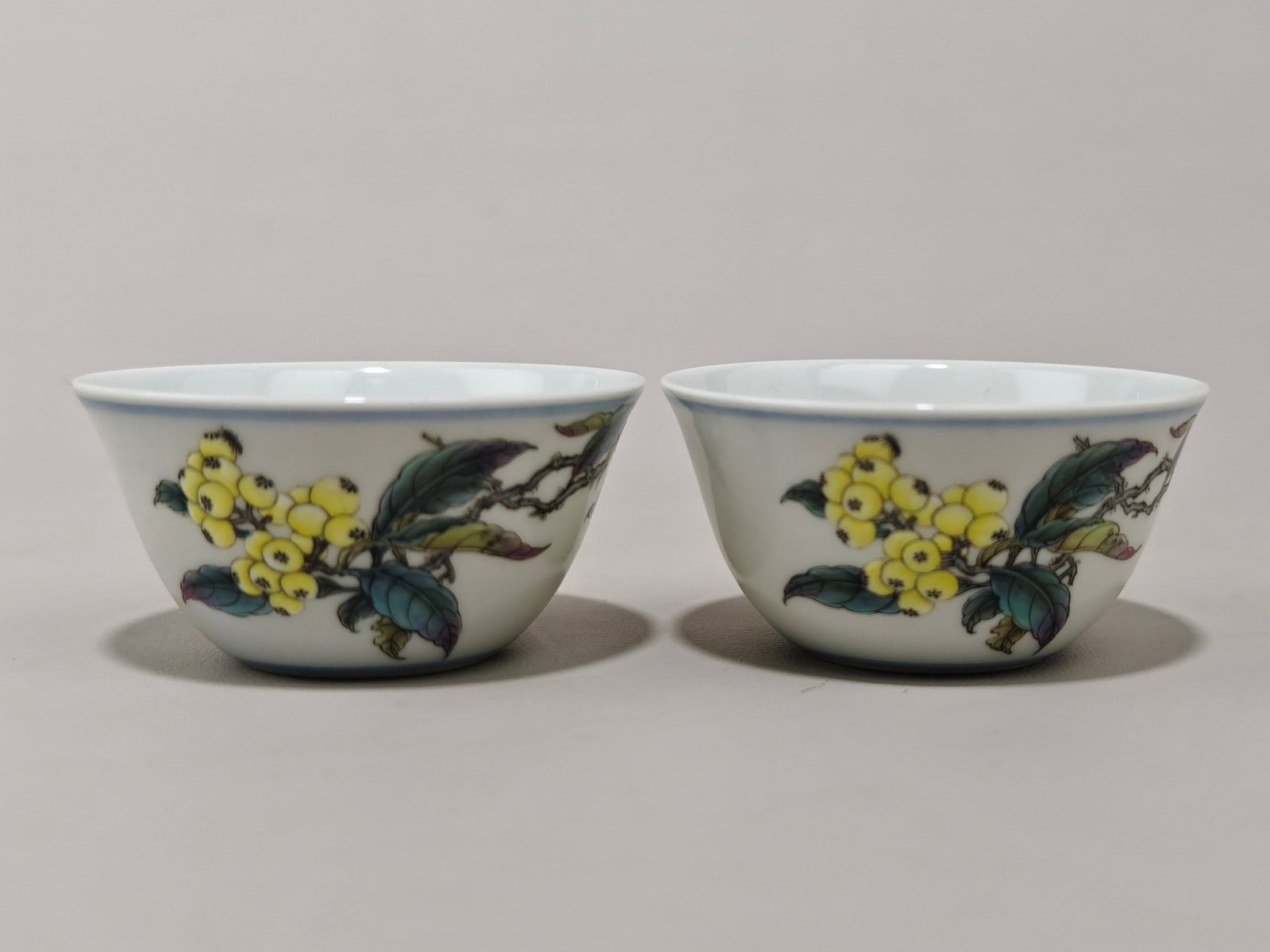 A Pair of Famille-Rose Melon and Fruit Pattern Cup: A Pair of Famille-Rose Melon and Fruit Pattern Cup,Qing Dynasty,China,with Yongzheng Six-character Mark,Size:1.4inx2.8in