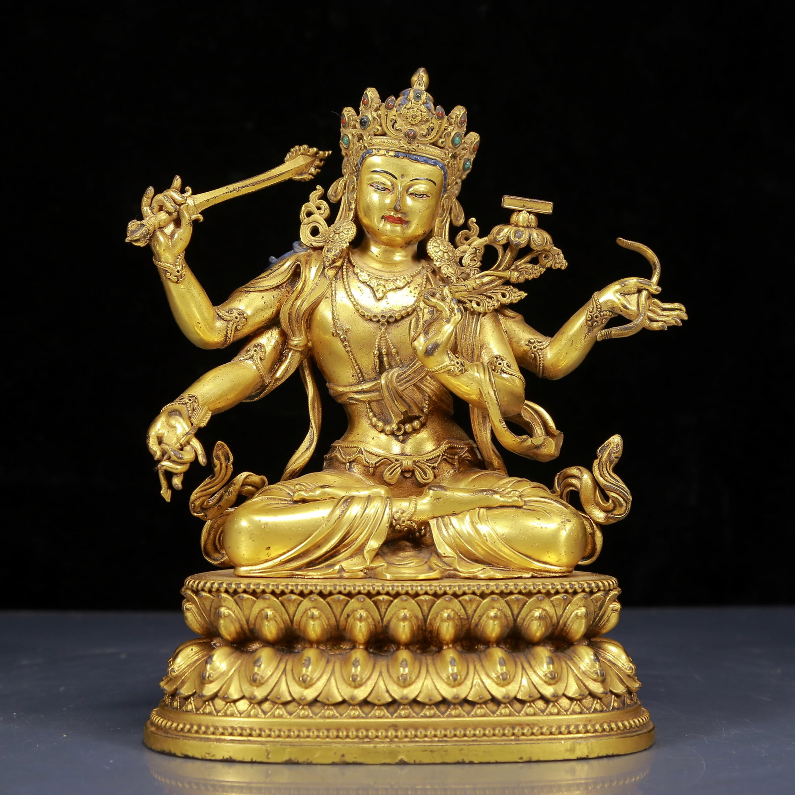 A Solemn Gilt Bronze Inlaid Gems Statue of Manjusri: A Solemn Gilt Bronze Inlaid Gems Statue of Manjusri,Ming Dynasty,China,Yongle Six-character Mark,Size:5.5inx4.3inx7.9in,Weight:1675g,铜鎏金嵌宝石文殊