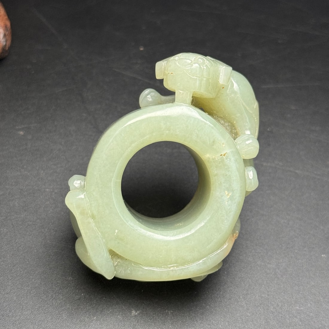 An Exquisite White Jade Dragon Pattern Fingerstall: An Exquisite White Jade Dragon Pattern Fingerstall,Qing Dynasty,China,Size:2.6inx1.8inx1.1in,Weight:102g,白玉龙纹扳指,中国清代