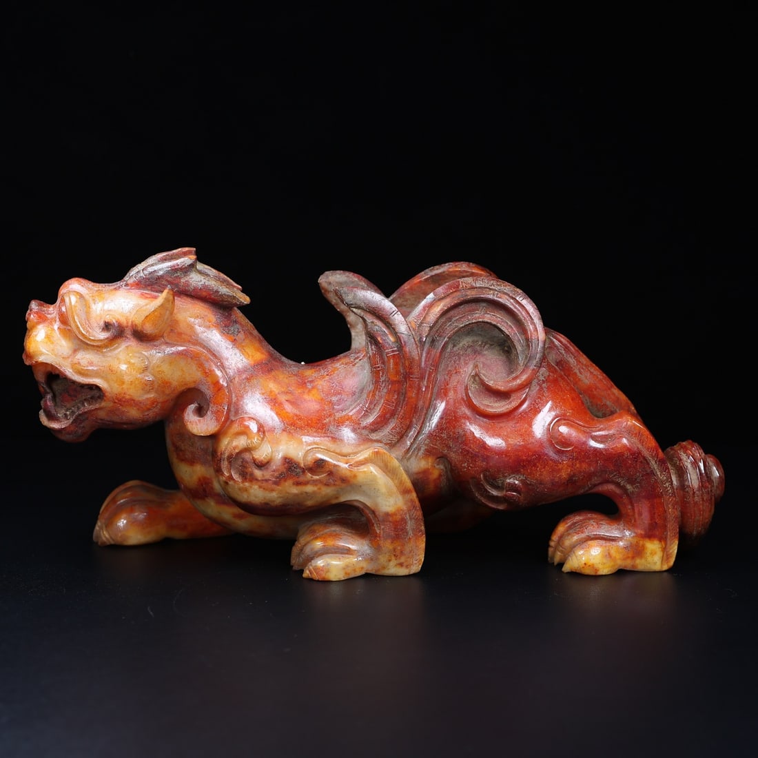 An Exquisite White Jade Auspicious Animal Ornament: An Exquisite White Jade Auspicious Animal Ornament,Han Dynasty,China,Size:12.4inx5inx4.3in,Weight:4065g,白玉瑞兽摆件,中国汉代