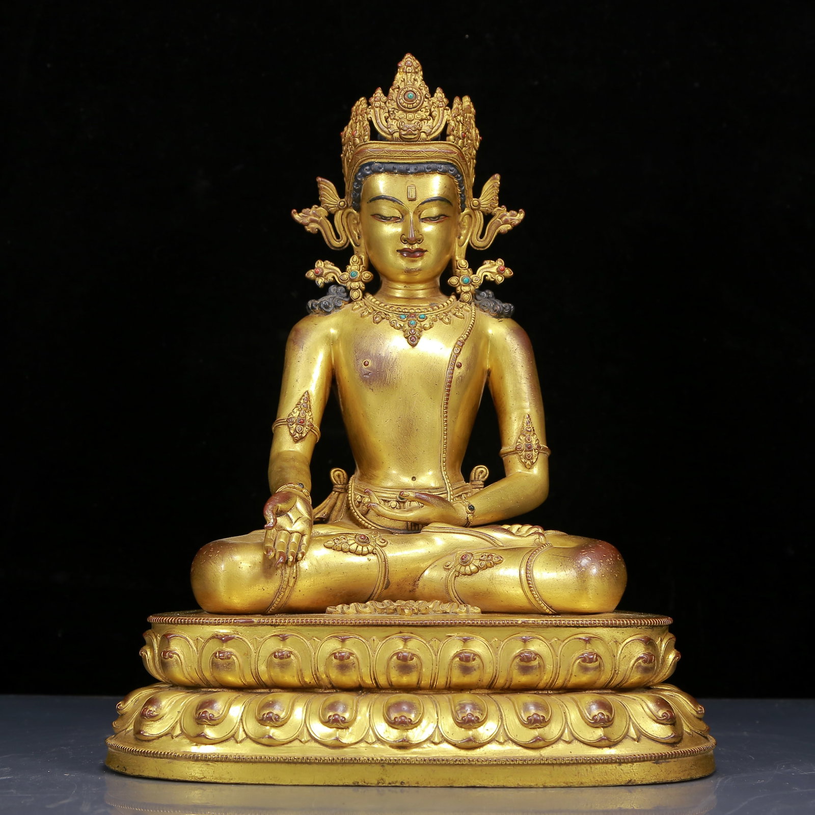 A Solemn Gilt Bronze Inlaid Gems Statue of Sakyamuni: A Solemn Gilt Bronze Inlaid Gems Statue of Sakyamuni,Ming