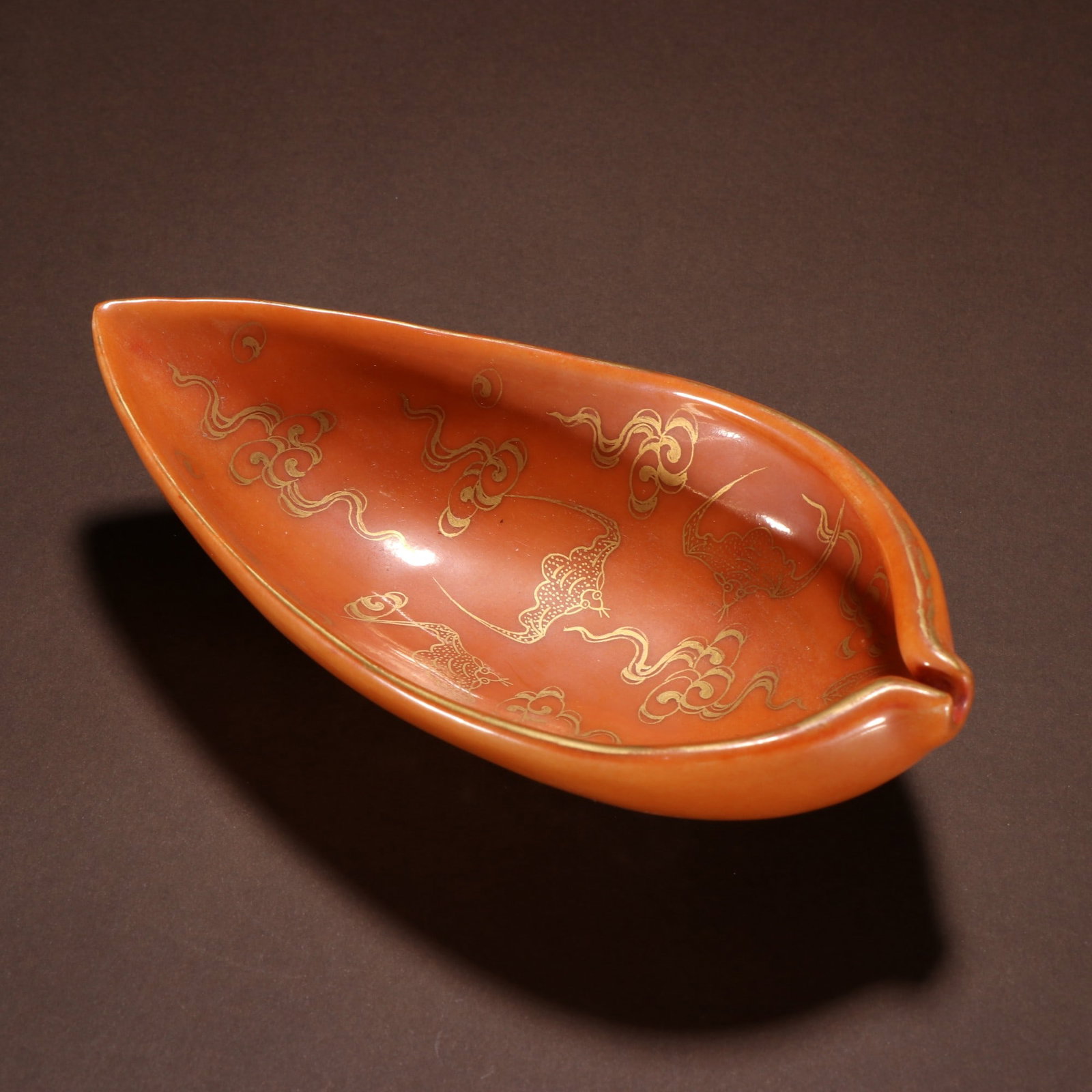An Exquisite Red Glaze Painted Gold Bats Pattern Brush Washer: An Exquisite Red Glaze Painted Gold Bats Pattern Brush Washer,Qing Dynasty,China,with Qianlong Six-character Mark,Size:1.6inx5.8inx3in,红釉描金蝙蝠纹笔&