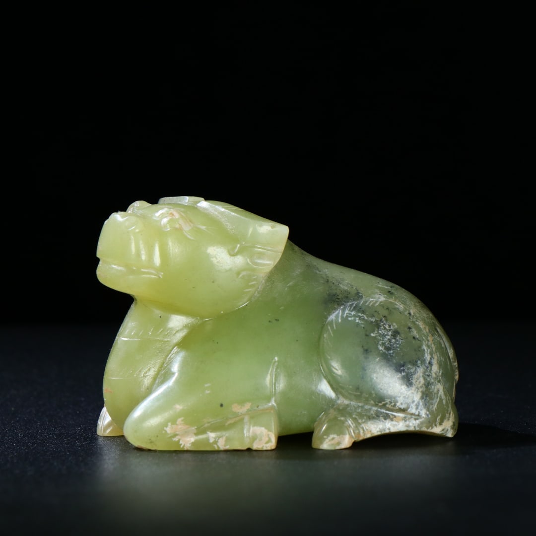 An Exquisite Greenish Jade Buffalo Ornament: An Exquisite Greenish Jade Buffalo Ornament,Han Dynasty,China,Size:2.4inx1.6inx1.4in,Weight:122g,青玉牛摆件,中国汉代