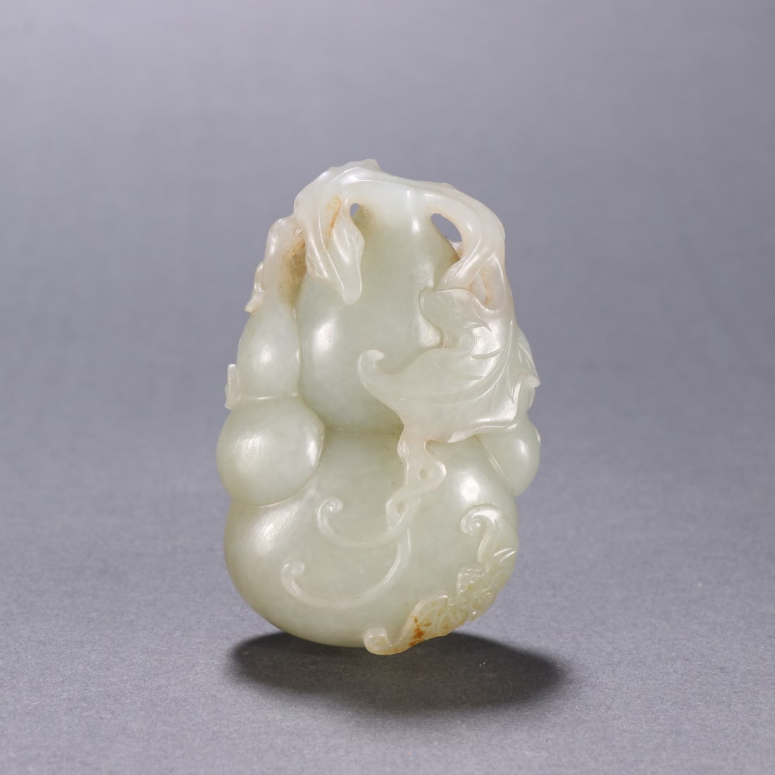 An Exquisite White Jade Gourd Ornament: An Exquisite White Jade Gourd Ornament,Qing Dynasty,China,Size:2.9inx1.9in,白玉葫芦摆件,中国清代