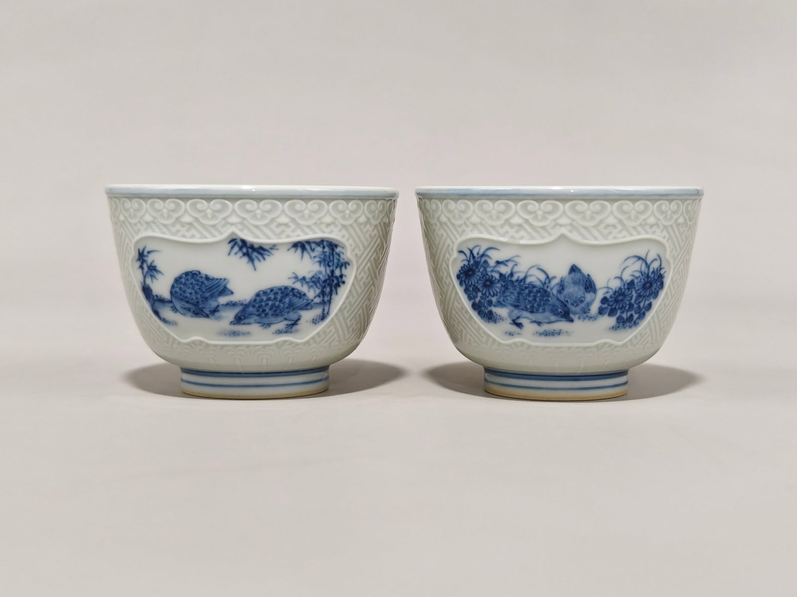 A Pair of Blue and White Flower and Bird Pattern Cup: A Pair of Blue and White Flower and Bird Pattern Cup,Qing Dynasty,China,with Yongzheng Six-character Mark,Size:2.2inx3.1in 一对青花花鸟纹杯,中