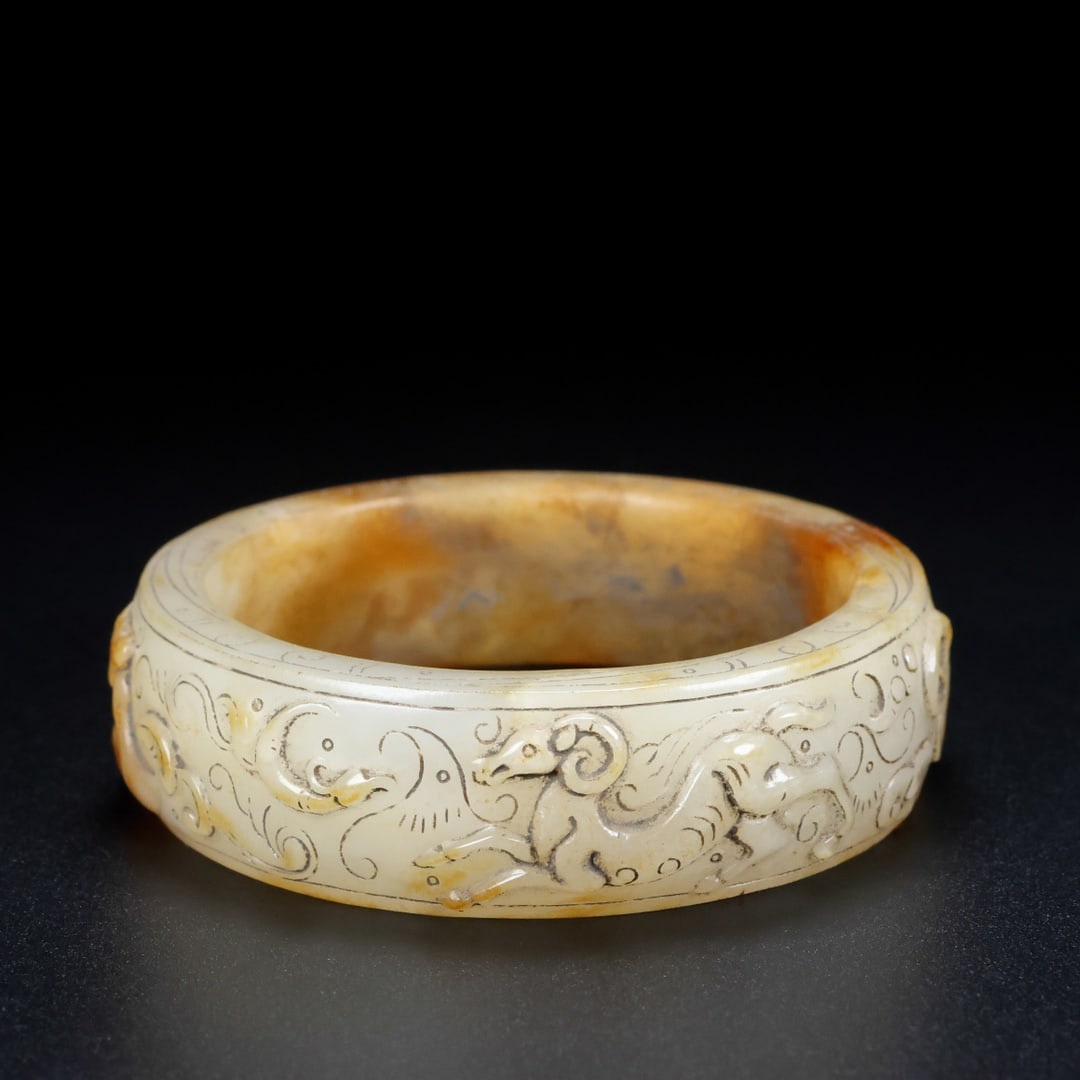 An Exquisite White Jade Auspicious Animal Pattern Bracelets (1 of 9)