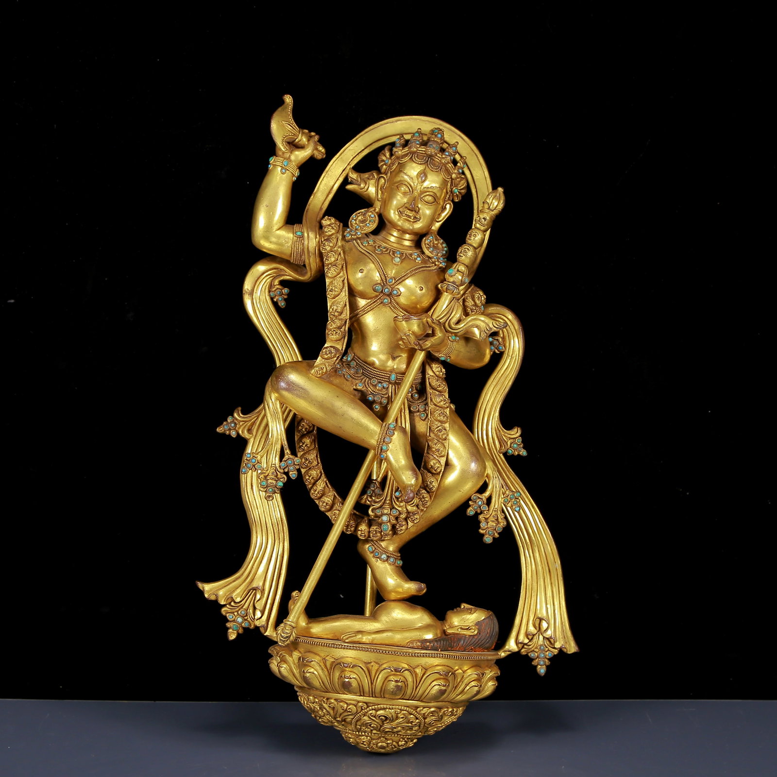 A Solemn Gilt Bronze Inlaid Turquoise Statue of Vajra: A Solemn Gilt Bronze Inlaid Turquoise Statue of Vajra,Ming Dynasty,China,Size:11.8inx5.1inx19.7in,Weight:7455g 铜鎏金嵌绿松石金刚像,中